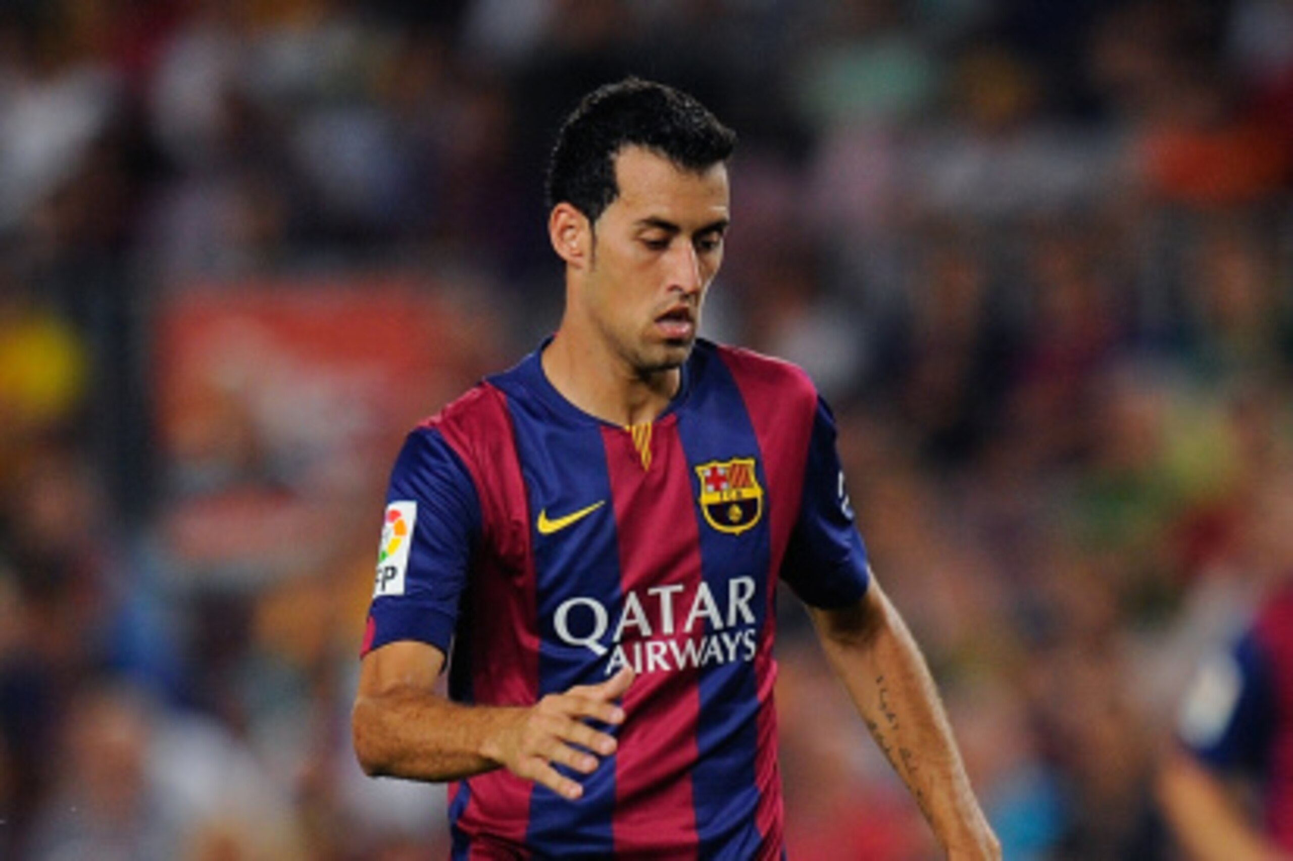 BARCELONA, SPAIN - AUGUST 24:  Sergio Busquets of FC Barcelona in action during the La Liga match between FC Barcelona and Elche FC at Camp Nou stadium on August 24, 2014 in Barcelona, Spain.  (Photo by Denis Doyle/Getty Images)