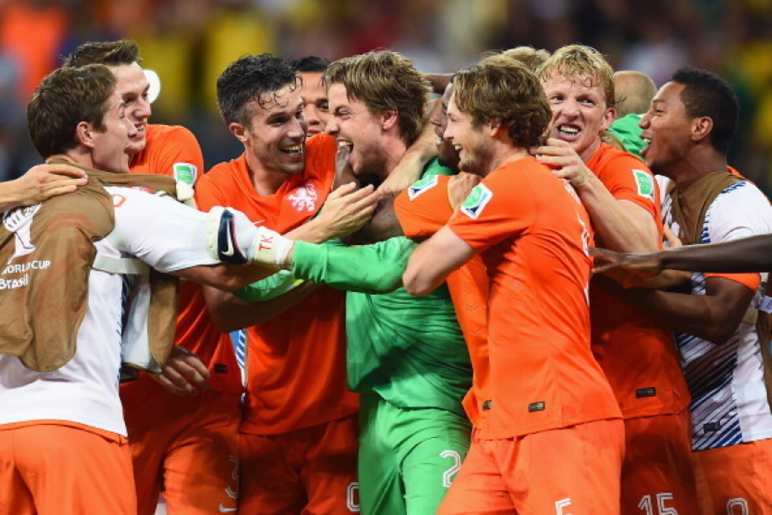 SALVADOR, BRAZIL - JULY 05:  Goalkeeper Tim Krul of the Netherlands celebrates with teammates after making a save in a penalty shootout to defeat Costa Rica during the 2014 FIFA World Cup Brazil Quarter Final match between the Netherlands and Costa Rica a