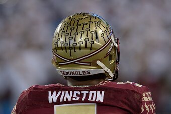CHARLOTTE, NC - DECEMBER 06:  Jameis Winston #5 of the Florida State Seminoles warms up before the Atlantic Coast Conference championship game against the Georgia Tech Yellow Jackets on December 6, 2014 at Bank of America Stadium in Greenville, North Caro