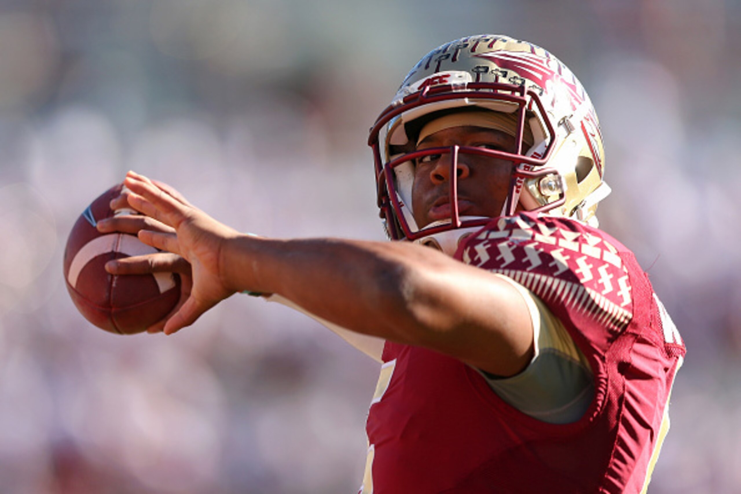 TALLAHASSEE, FL - NOVEMBER 29:  Jameis Winston #5 of the Florida State Seminoles warms up before  a game against the Florida Gators  at Doak Campbell Stadium on November 29, 2014 in Tallahassee, Florida.  (Photo by Mike Ehrmann/Getty Images)
