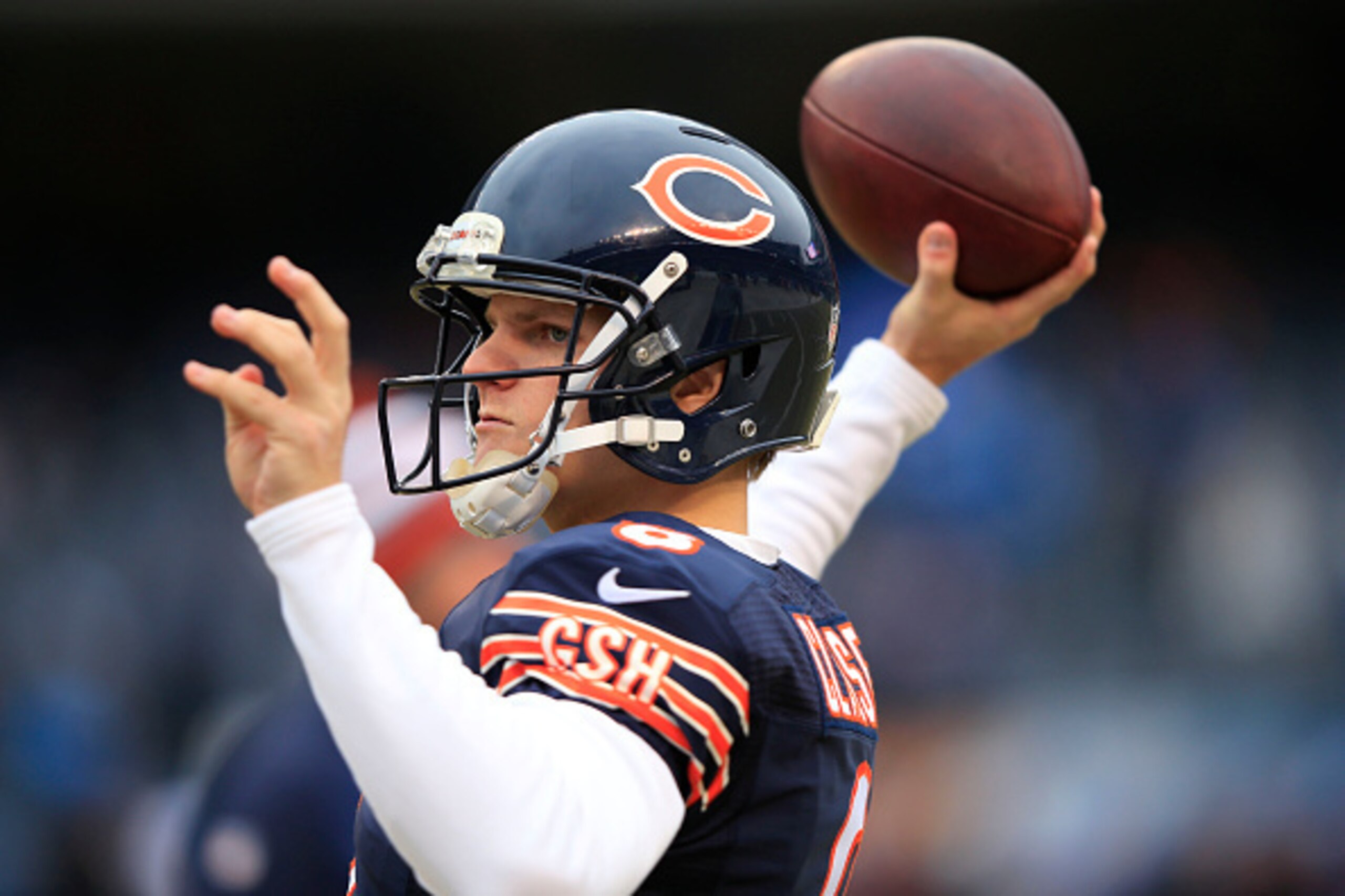 CHICAGO, IL - DECEMBER 21: Jimmy Clausen #8 of the Chicago Bears warms up before their game against the Detroit Lions at Soldier Field on December 21, 2014 in Chicago, Illinois. (Photo by Jamie Squire/Getty Images)