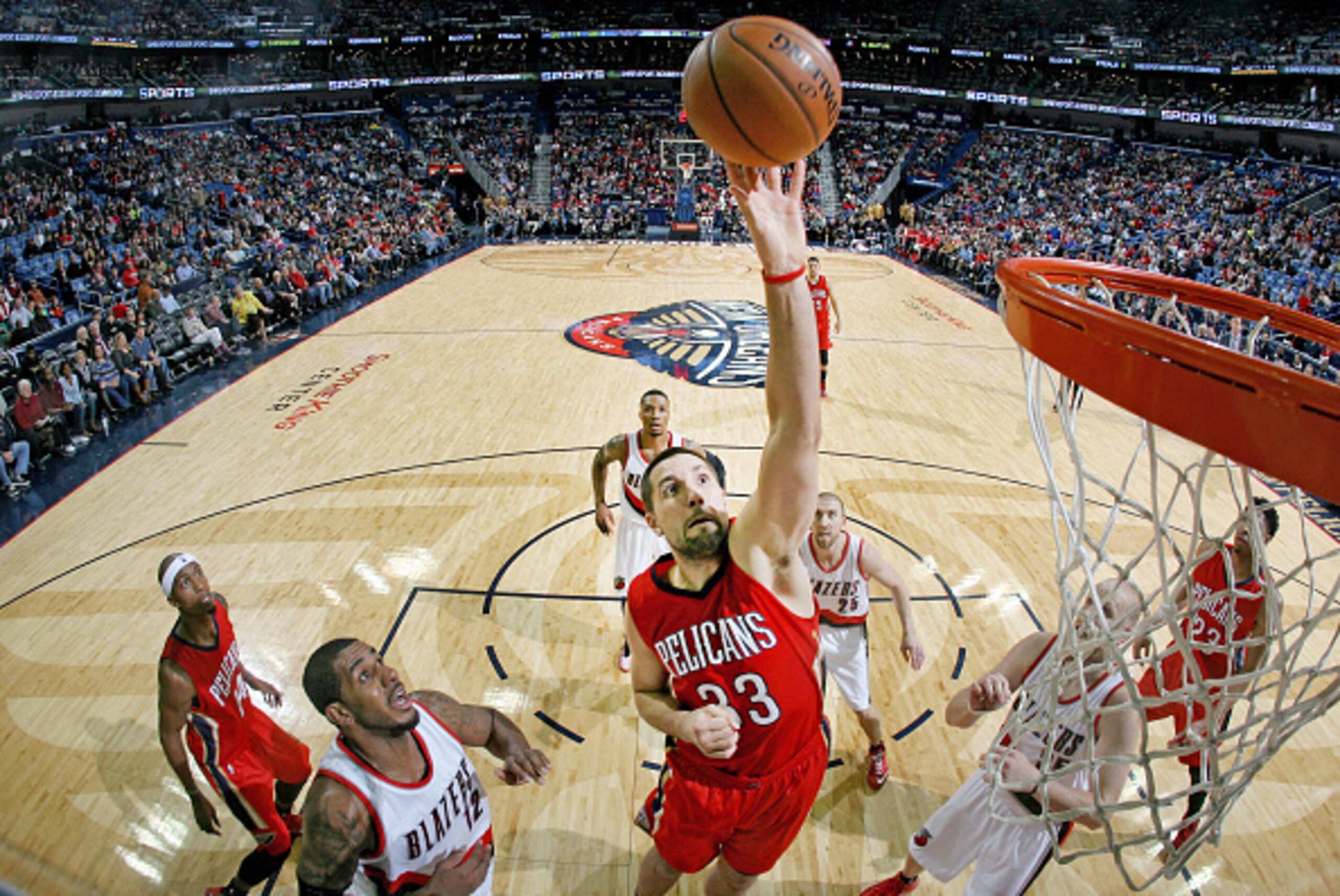NEW ORLEANS, LA -  DECEMBER 20: Ryan Anderson #33 of the New Orleans Pelicans reaches for the rebound against the Portland Trail Blazers during the game on December 20, 2014 at Smoothie King Center in New Orleans, Louisiana. NOTE TO USER: User expressly a