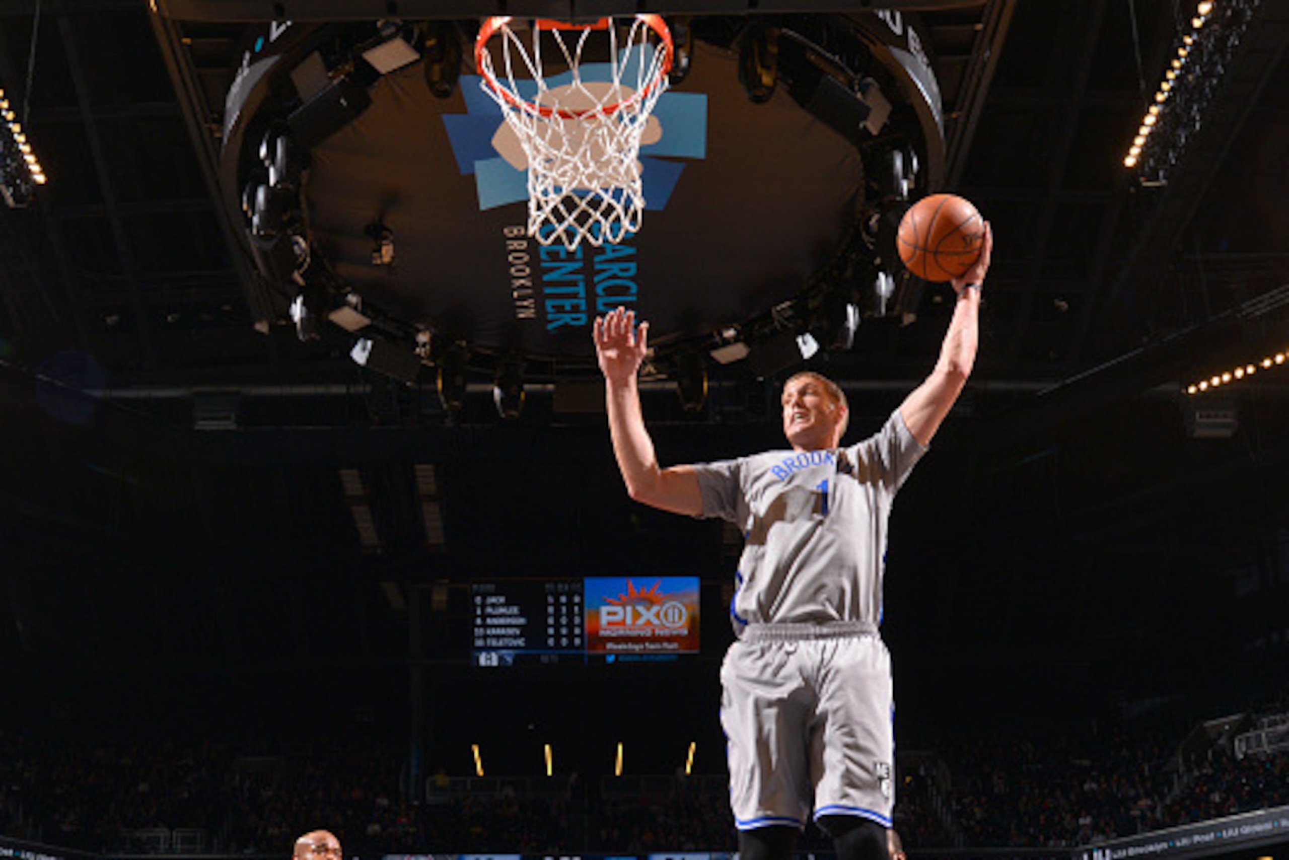 BROOKLYN,NY - DECEMBER 21: Mason Plumlee #1 of the Brooklyn Nets grabs the rebound against the Detroit Pistons on December 21, 2014 at the Barclays Center in Brooklyn, NY. NOTE TO USER: User expressly acknowledges and agrees that, by downloading and or us BROOKLYN,NY - DECEMBER 21: Mason Plumlee #1 of the Brooklyn Nets grabs the rebound against the Detroit Pistons on December 21, 2014 at the Barclays Center in Brooklyn, NY. NOTE TO USER: User expressly acknowledges and agrees that, by downloading and or us