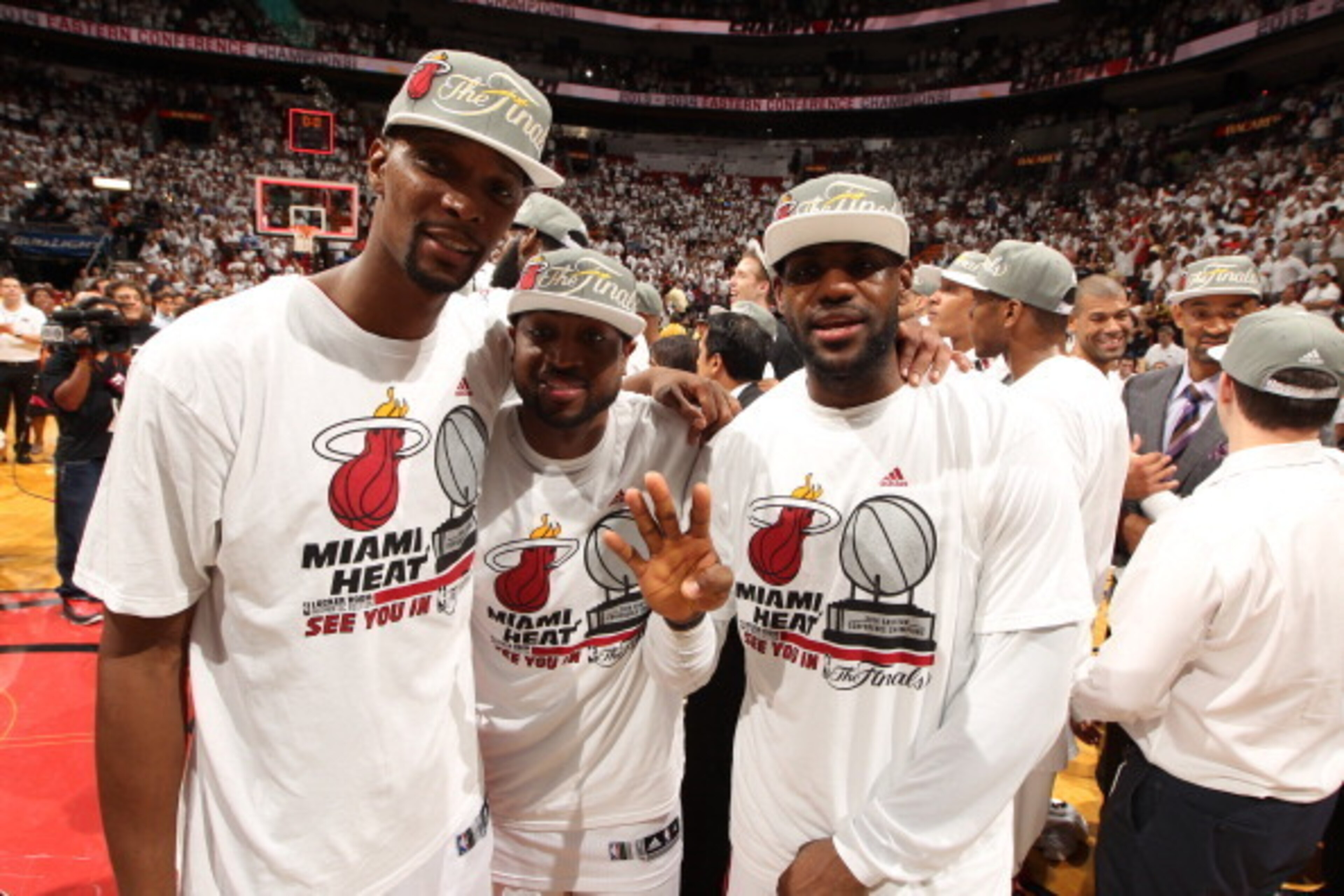 MIAMI, FL - MAY 30: Chris Bosh #1, Dwyane Wade #3, and LeBron James #6 of the Miami Heat celebrate after Game Six of the Eastern Conference Finals against the Indiana Pacers during the 2014 NBA Playoffs on May 30, 2014 in Miami, Fl. NOTE TO USER: User exp