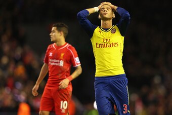LIVERPOOL, ENGLAND - DECEMBER 21: Kieran Gibbs of Arsenal looks dejected during the Barclays Premier League match between Liverpool and Arsenal at Anfield on December 21, 2014 in Liverpool, England.  (Photo by Alex Livesey/Getty Images)