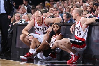 PORTLAND, OR - NOVEMBER 21:  Steve Blake #25 and Chris Kaman #35 of the Portland Trail Blazers wait to get in the game against the Chicago Bulls on November 21, 2014 at the Moda Center Arena in Portland, Oregon. NOTE TO USER: User expressly acknowledges a