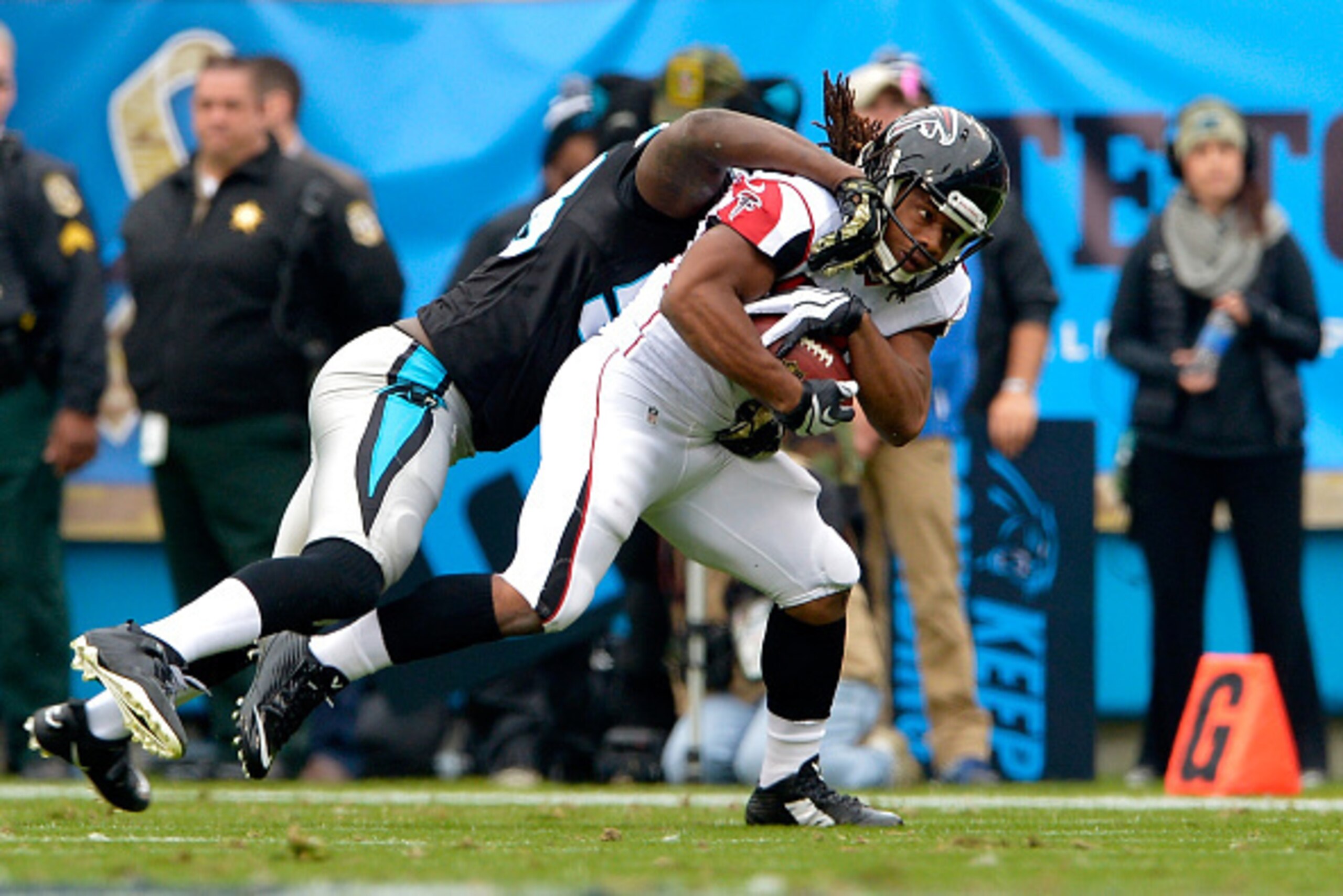 CHARLOTTE, NC - NOVEMBER 16: Thomas Davis #58 of the Carolina Panthers tackles Jacquizz Rodgers #32 of the Atlanta Falcons in the 2nd quarter during their game at Bank of America Stadium on November 16, 2014 in Charlotte, North Carolina. (Photo by Grant CHARLOTTE, NC - NOVEMBER 16: Thomas Davis #58 of the Carolina Panthers tackles Jacquizz Rodgers #32 of the Atlanta Falcons in the 2nd quarter during their game at Bank of America Stadium on November 16, 2014 in Charlotte, North Carolina. (Photo by Grant
