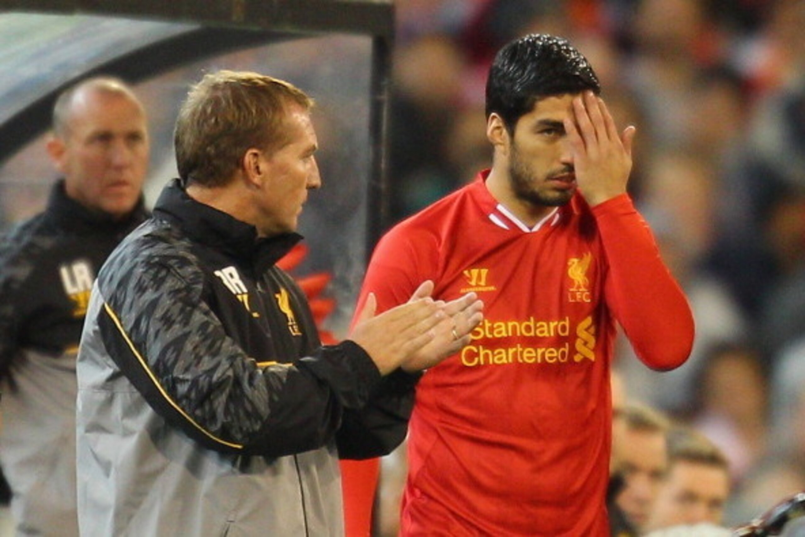MELBOURNE, AUSTRALIA - JULY 24: Liverpool FC Manager Brendan Rodgers (L) looks on as Luis Suarez of Liverpool is substituted into the match during the match between the Melbourne Victory and Liverpool at the Melbourne Cricket Ground on July 24, 2013 in M MELBOURNE, AUSTRALIA - JULY 24: Liverpool FC Manager Brendan Rodgers (L) looks on as Luis Suarez of Liverpool is substituted into the match during the match between the Melbourne Victory and Liverpool at the Melbourne Cricket Ground on July 24, 2013 in M