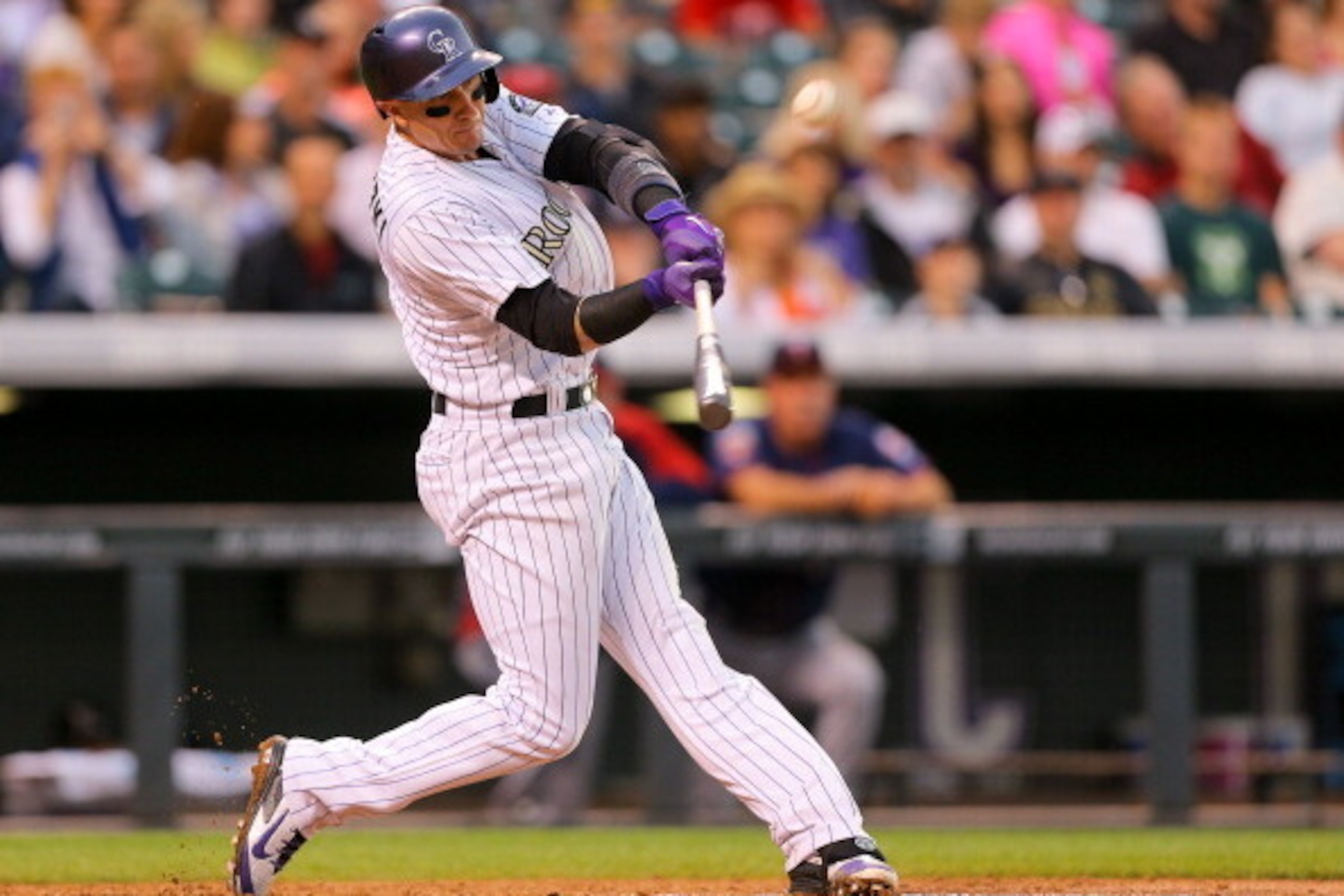 DENVER, CO - JULY 11: Troy Tulowitzki #2 of the Colorado Rockies hits a two run home run during the third inning against the Minnesota Twins at Coors Field on July 11, 2014 in Denver, Colorado. (Photo by Justin Edmonds/Getty Images) DENVER, CO - JULY 11: Troy Tulowitzki #2 of the Colorado Rockies hits a two run home run during the third inning against the Minnesota Twins at Coors Field on July 11, 2014 in Denver, Colorado. (Photo by Justin Edmonds/Getty Images)