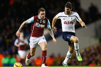LONDON, ENGLAND - DECEMBER 20: Danny Ings of Burnley takes on Federico Fazio of Tottenham Hotspur during the Barclays Premier League match between Tottenham Hotspur and Burnley at White Hart Lane on December 20, 2014 in London, England.  (Photo by Clive R