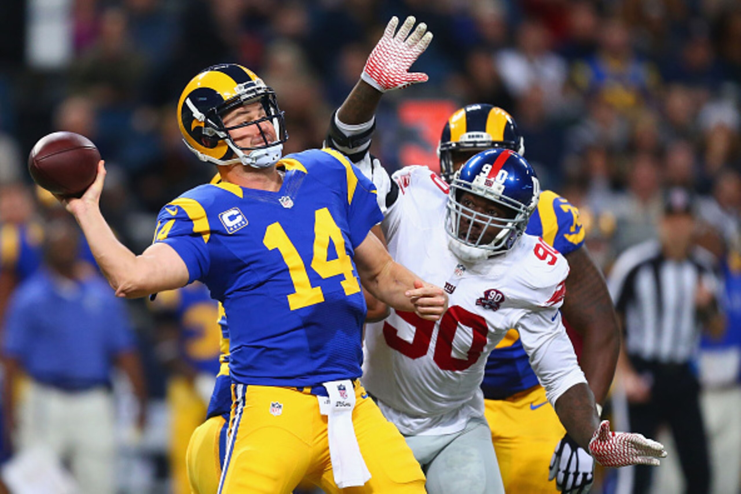 ST. LOUIS, MO - DECEMBER 21: Jason Pierre-Paul #90 of the New York Giants looks to sack Shaun Hill #14 of the St. Louis Rams during the third quarter at the Edward Jones Dome on December 21, 2014 in St. Louis, Missouri.  (Photo by Dilip Vishwanat/Getty Im