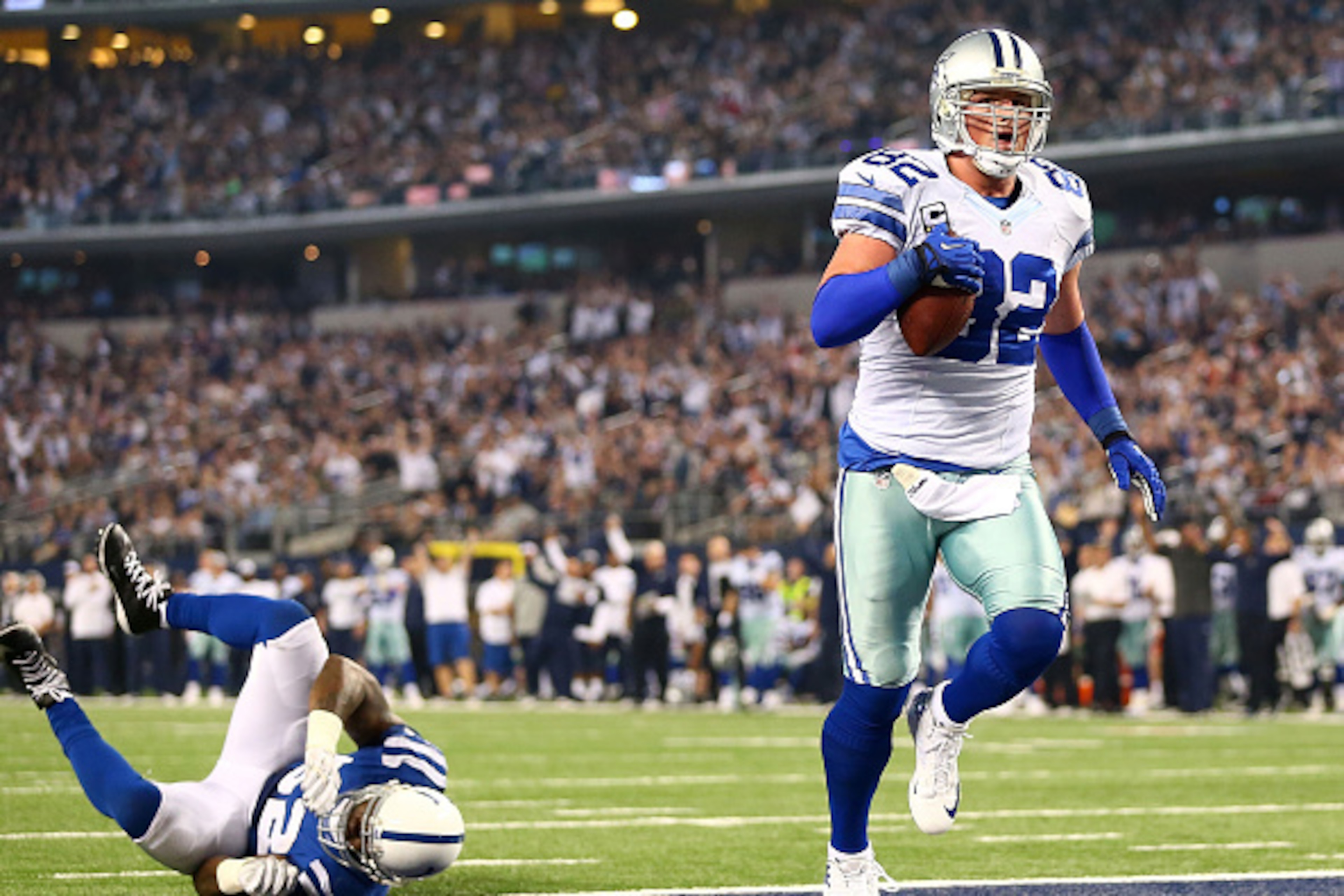 ARLINGTON, TX - DECEMBER 21: D'Qwell Jackson #52 of the Indianapolis Colts rolls on the turf as Jason Witten #82 of the Dallas Cowboys scores a touchdown in the second half at AT&T Stadium on December 21, 2014 in Arlington, Texas. (Photo by Ronald Marti ARLINGTON, TX - DECEMBER 21: D'Qwell Jackson #52 of the Indianapolis Colts rolls on the turf as Jason Witten #82 of the Dallas Cowboys scores a touchdown in the second half at AT&T Stadium on December 21, 2014 in Arlington, Texas. (Photo by Ronald Marti