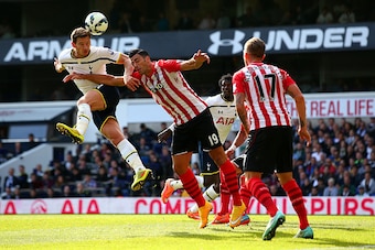LONDON, ENGLAND - OCTOBER 05:  Jan Vertonghen of Spurs heads towards goal under pressure from Graziano Pelle of Southampton during the Barclays Premier League match between Tottenham Hotspur and Southampton at White Hart Lane on October 5, 2014 in London,