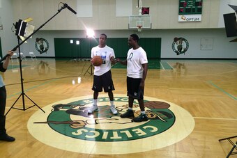 Rondo with his older brother, Will, inside the Celtics' practice center about a week before the trade. Will has assisted Rondo with his workouts since his rookie year.