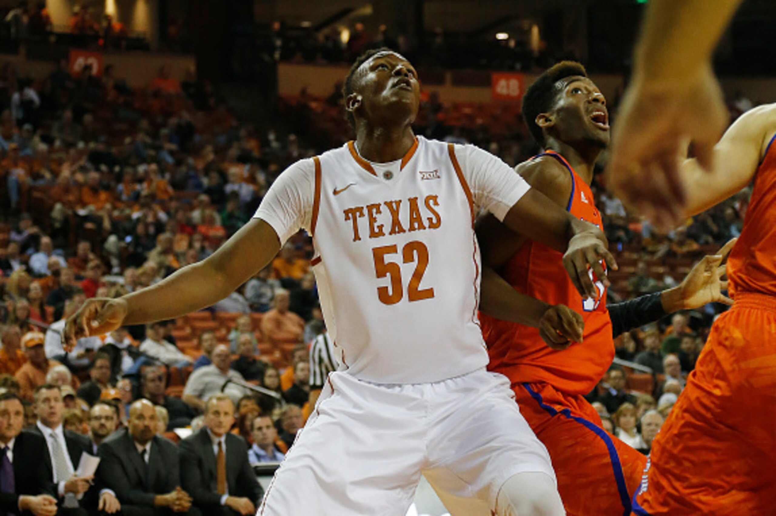 AUSTIN, TX - DECEMBER 2: Myles Turner #52 of the Texas Longhorns battles for position with Brandon Williams #11 of the Texas-Arlington Mavericks at the Frank Erwin Center on December 2, 2014 in Austin, Texas. (Photo by Chris Covatta/Getty Images)