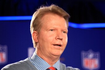INDIANAPOLIS, IN - FEBRUARY 01:  CBS NFL gmae analyst Phil Simms speaks during a press conference for the FedEx Air & Ground NFL Players of the Year in the Super Bowl XLVI Media Center at the J.W. Marriott Indianapolis on February 1, 2012 in Indianapolis,