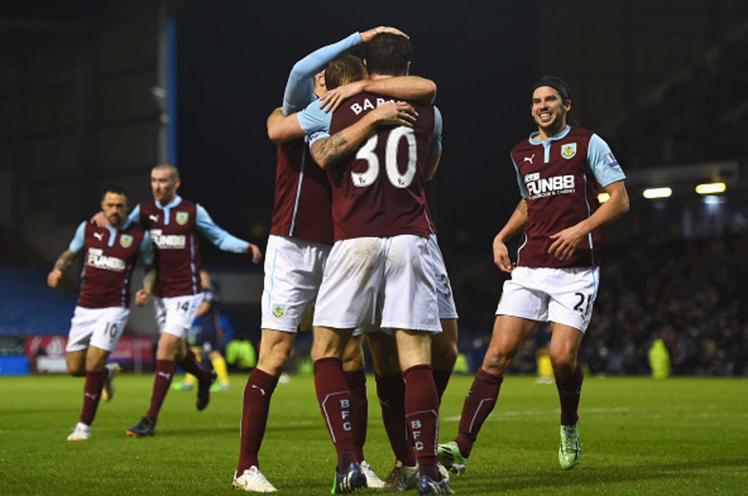 BURNLEY, ENGLAND - DECEMBER 13:  Ashley Barnes of Burnley celebrates his goal with team mates during the Barclays Premier League match between Burnley and Southampton at Turf Moor on December 13, 2014 in Burnley, England.  (Photo by Shaun Botterill/Getty 