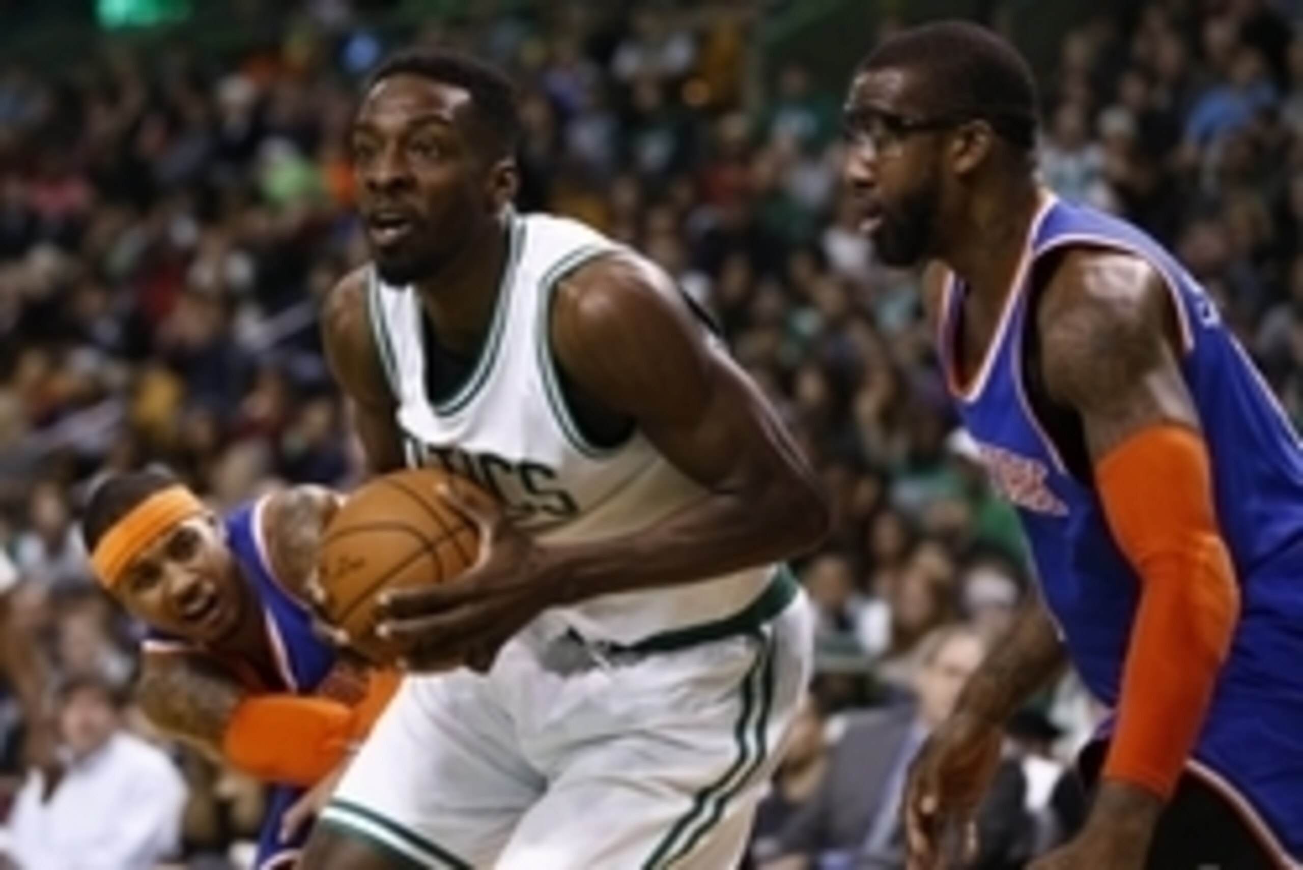 Dec 12, 2014; Boston, MA, USA; Boston Celtics forward Jeff Green (8) drives to the hoop againt New York Knicks forward Carmelo Anthony (left) and forward Amar'e Stoudemire (right) during the second half at TD Garden. Mandatory Credit: Mark L. Baer-USA TOD