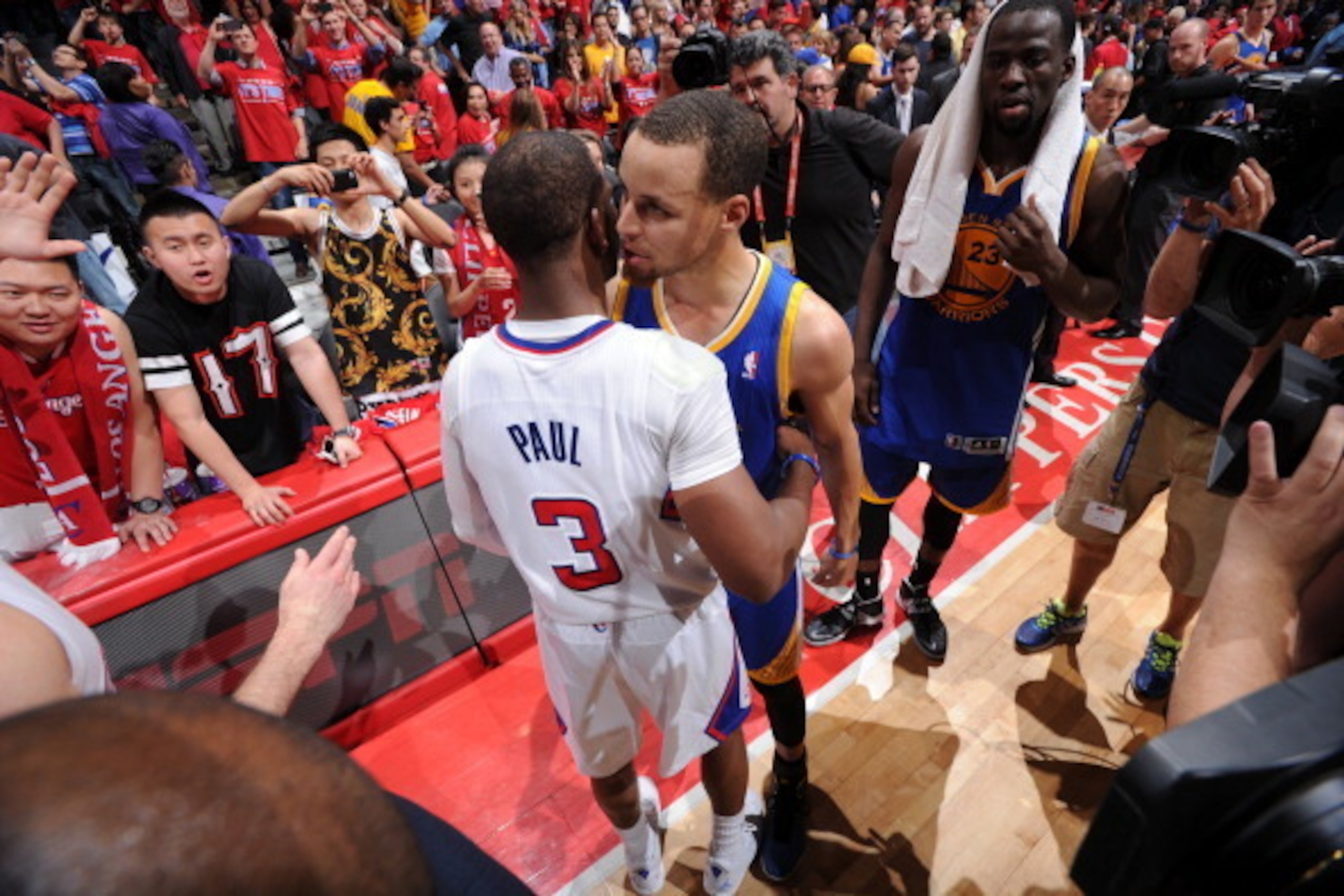 LOS ANGELES, CA - MAY 3: Chris Paul #3 of the Los Angeles Clippers and Stephen Curry #30 of the Golden State Warriors embrace after Game Seven of the Western Conference Quarterfinals during the 2014 NBA Playoffs at Staples Center on May 3, 2014 in Los Ang