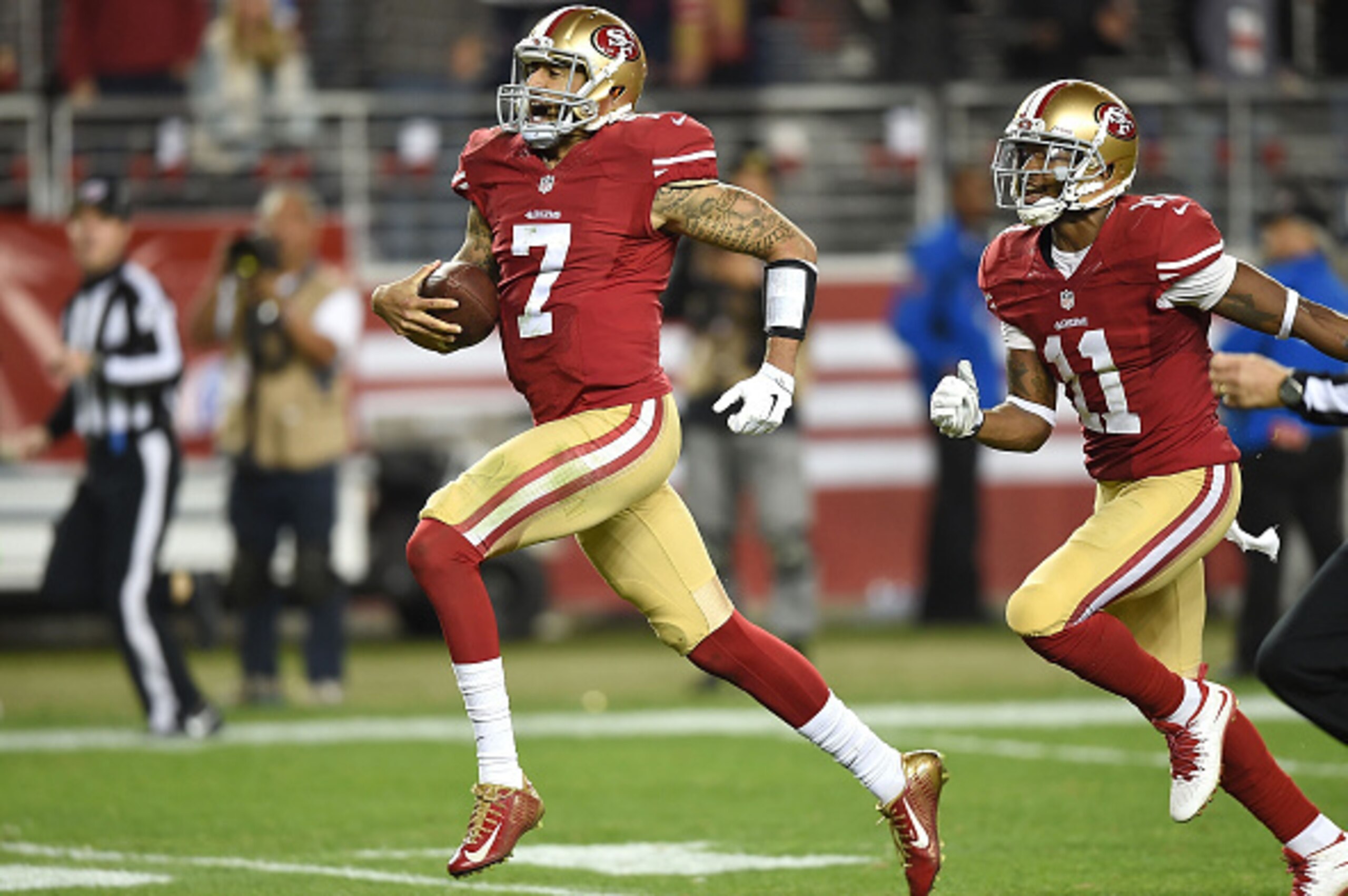 SANTA CLARA, CA - DECEMBER 20:  Colin Kaepernick #7 of the San Francisco 49ers scrambles for a 90 yard touchdown in the third quarter against the San Diego Chargers at Levi's Stadium on December 20, 2014 in Santa Clara, California.  (Photo by Thearon W. H