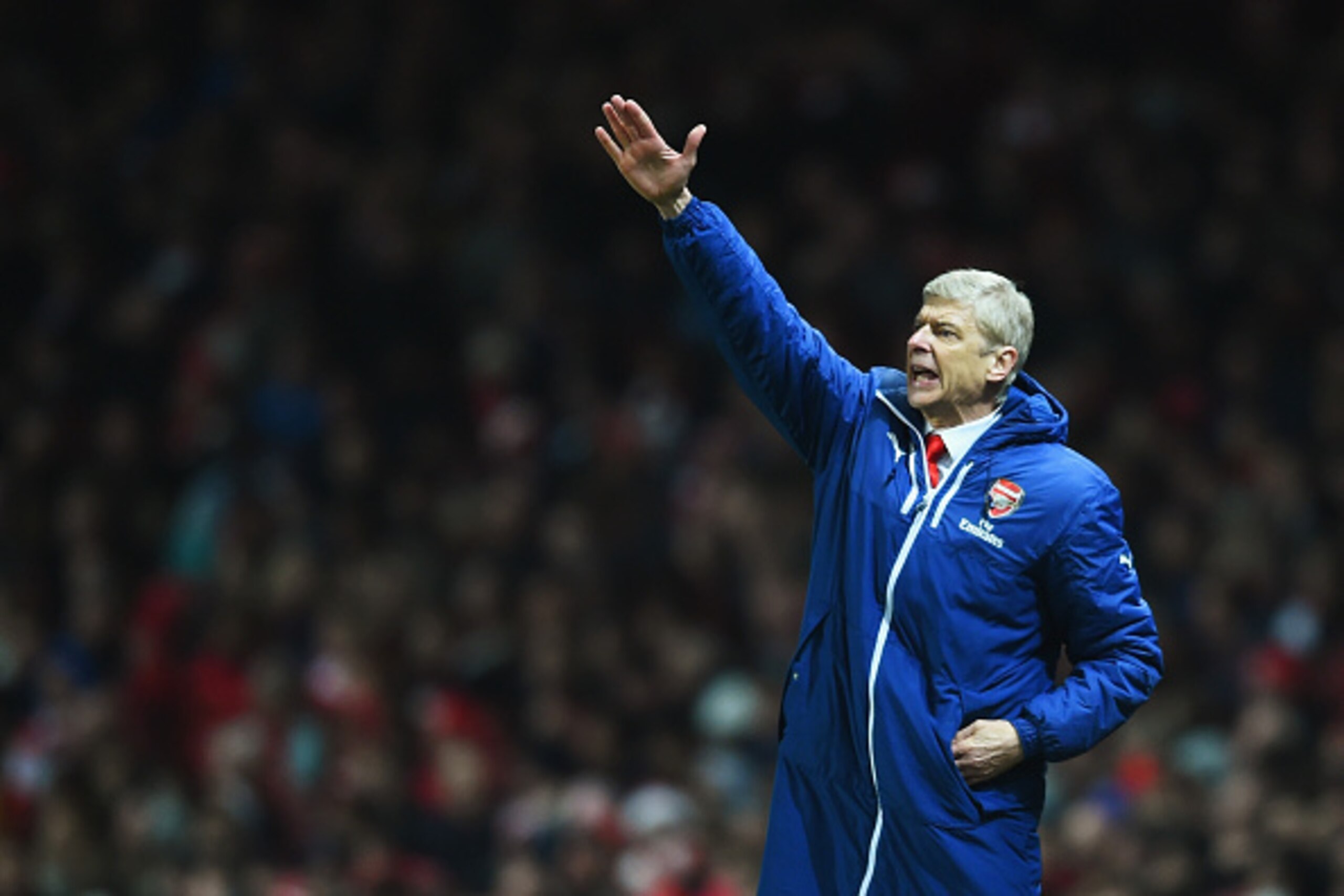LONDON, ENGLAND - DECEMBER 13: Arsene Wenger, manager of Arsenal gives instructions during the Barclays Premier League match between Arsenal and Newcastle United at Emirates Stadium on December 13, 2014 in London, England.  (Photo by Paul Gilham/Getty Ima