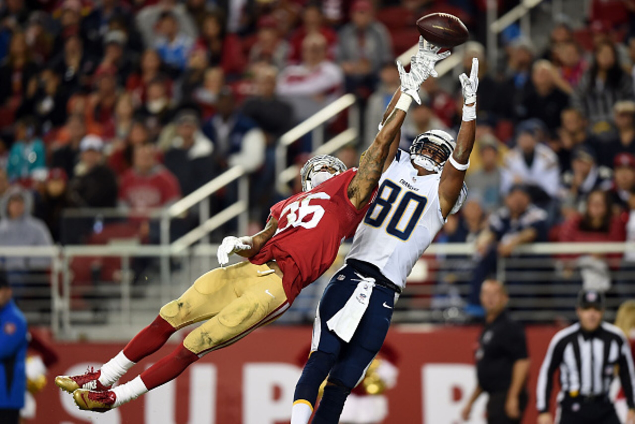 SANTA CLARA, CA - DECEMBER 20: Malcom Floyd #80 of the San Diego Chargers misses a pass behind the defense of Dontae Johnson #36 of the San Francisco 49ers in the third quarter at Levi's Stadium on December 20, 2014 in Santa Clara, California. (Photo by SANTA CLARA, CA - DECEMBER 20: Malcom Floyd #80 of the San Diego Chargers misses a pass behind the defense of Dontae Johnson #36 of the San Francisco 49ers in the third quarter at Levi's Stadium on December 20, 2014 in Santa Clara, California. (Photo by