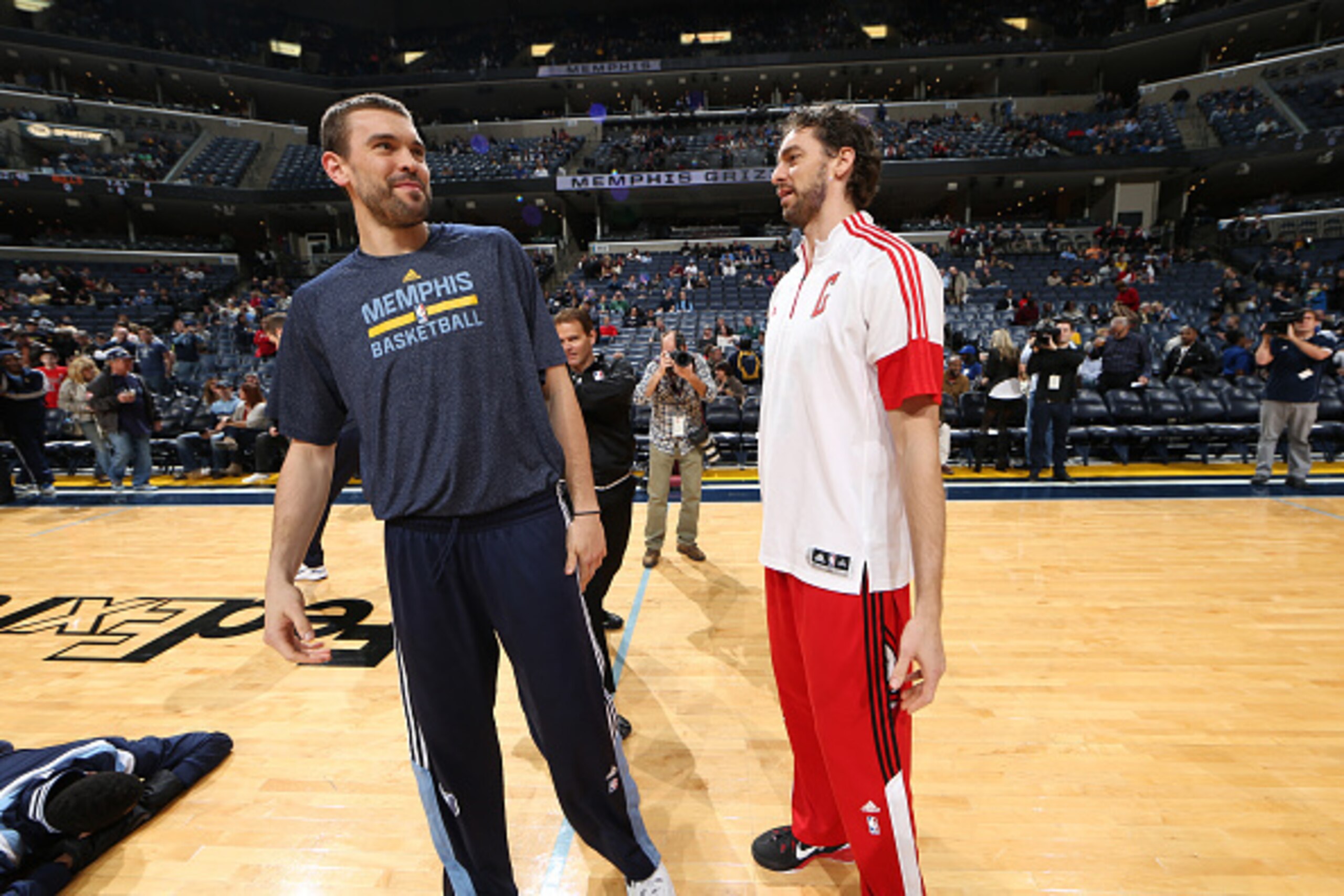 MEMPHIS, TN - DECEMBER 19:  Marc Gasol #33 of the Memphis Grizzlies speaks with his brother Pau Gasol #16 of the Chicago Bulls on December 19, 2014 at the FedExForum in Memphis, Tennessee.  NOTE TO USER: User expressly acknowledges and agrees that, by dow