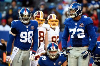 EAST RUTHERFORD, NJ - DECEMBER 14:  Kerry Wynn #72 of the New York Giants celebrates a stop against the Washington Redskins during their game at MetLife Stadium on December 14, 2014 in East Rutherford, New Jersey.  (Photo by Alex Goodlett/Getty Images)