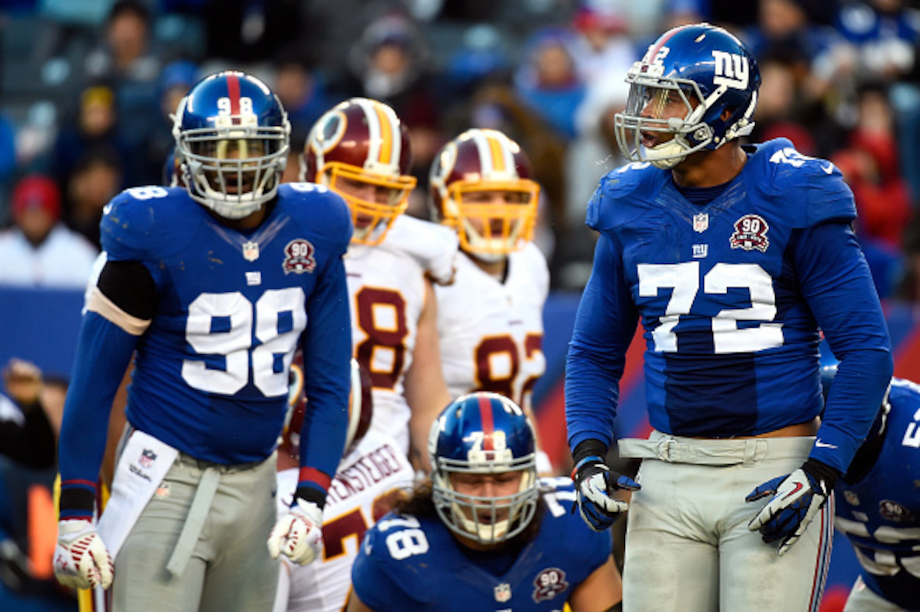 EAST RUTHERFORD, NJ - DECEMBER 14:  Kerry Wynn #72 of the New York Giants celebrates a stop against the Washington Redskins during their game at MetLife Stadium on December 14, 2014 in East Rutherford, New Jersey.  (Photo by Alex Goodlett/Getty Images)