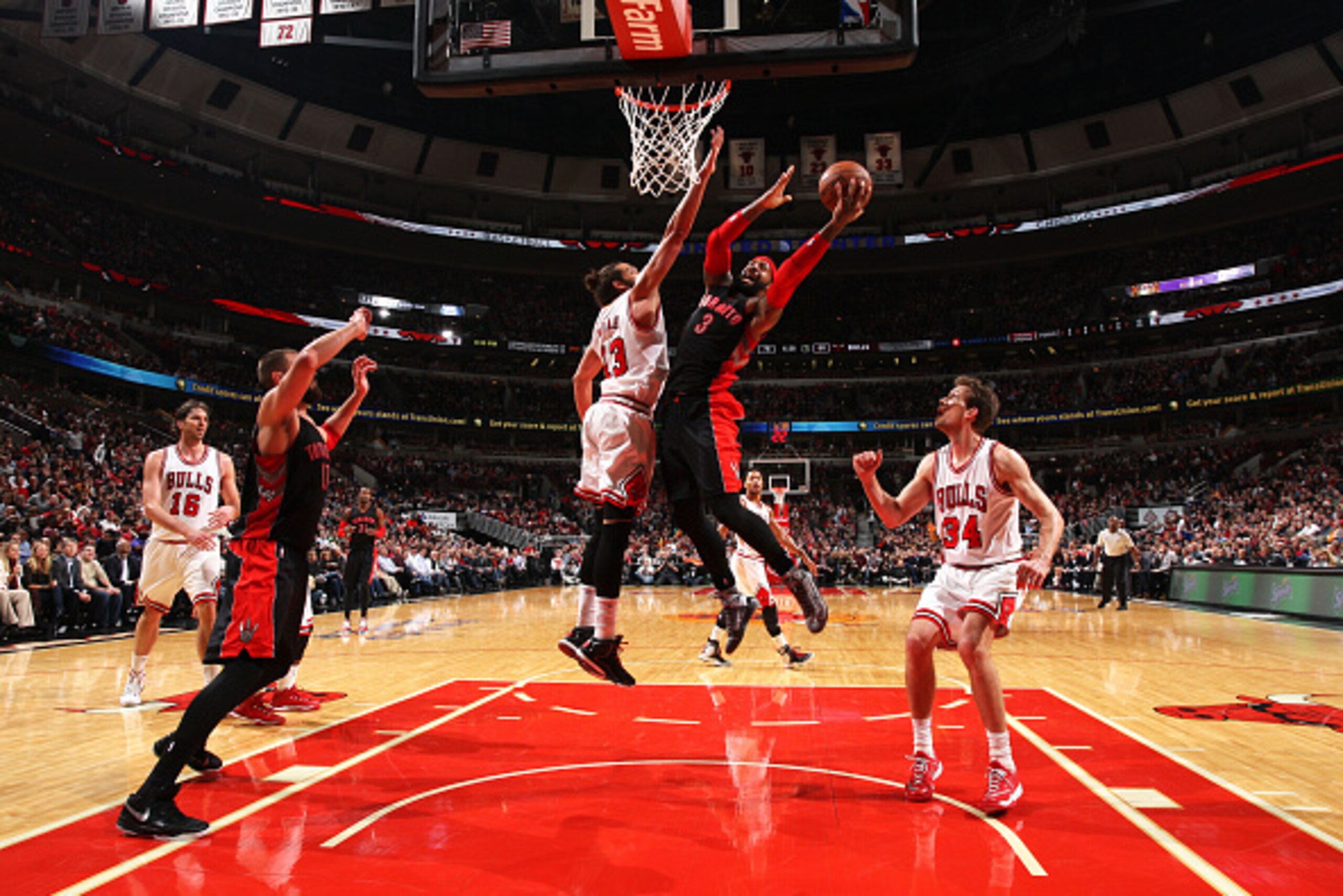 CHICAGO, IL - DECEMBER 22:  James Johnson #3 of the Toronto Raptors goes up for a shot against the Chicago Bulls on December 22, 2014 at the United Center in Chicago, Illinois. NOTE TO USER: User expressly acknowledges and agrees that, by downloading and 