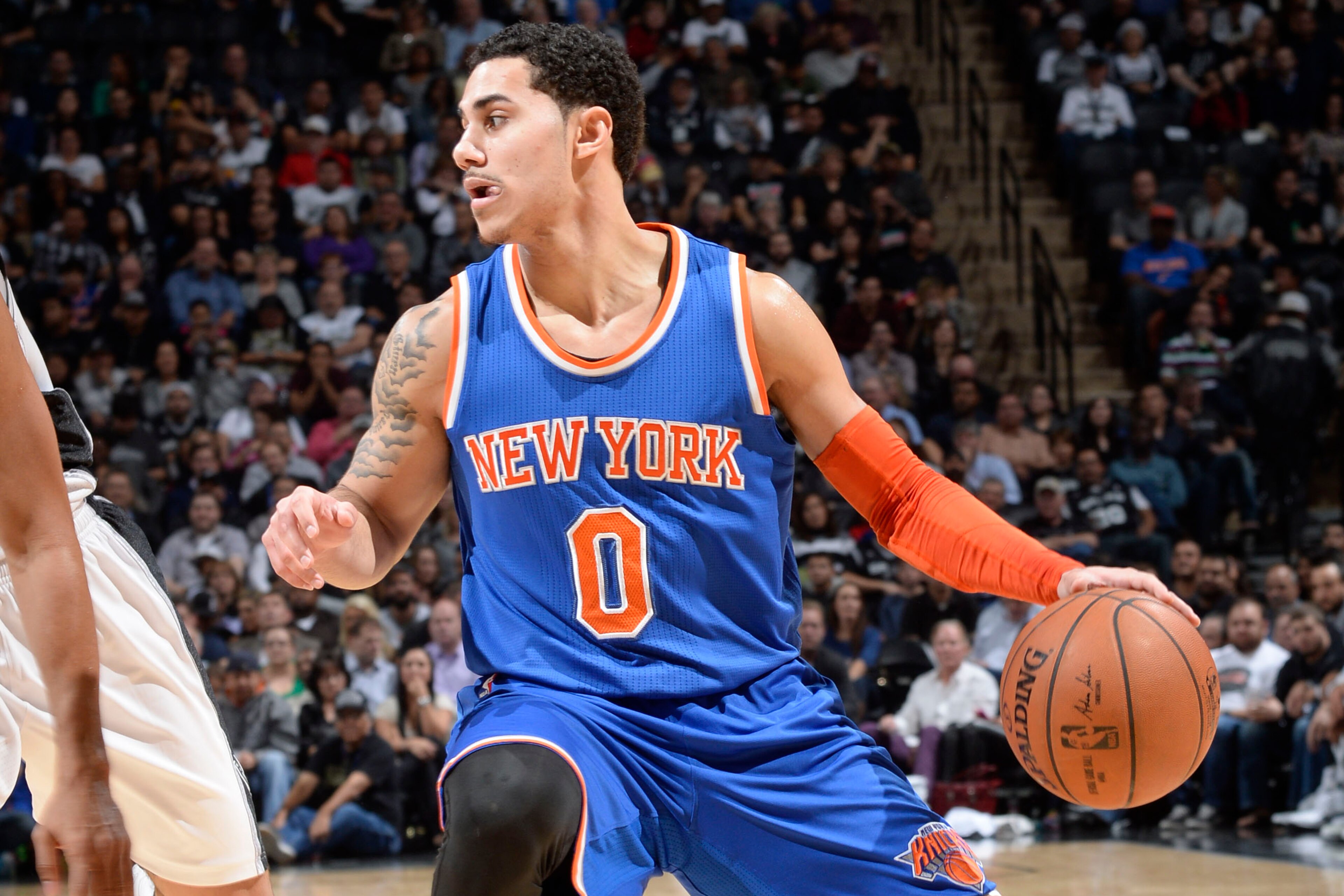 SAN ANTONIO - DECEMBER 10: Shane Larkin #0 of the New York Knicks handles the ball against the San Antonio Spurs at the AT&T Center on December 10, 2014 in San Antonio, Texas. NOTE TO USER: User expressly acknowledges and agrees that, by downloading and o