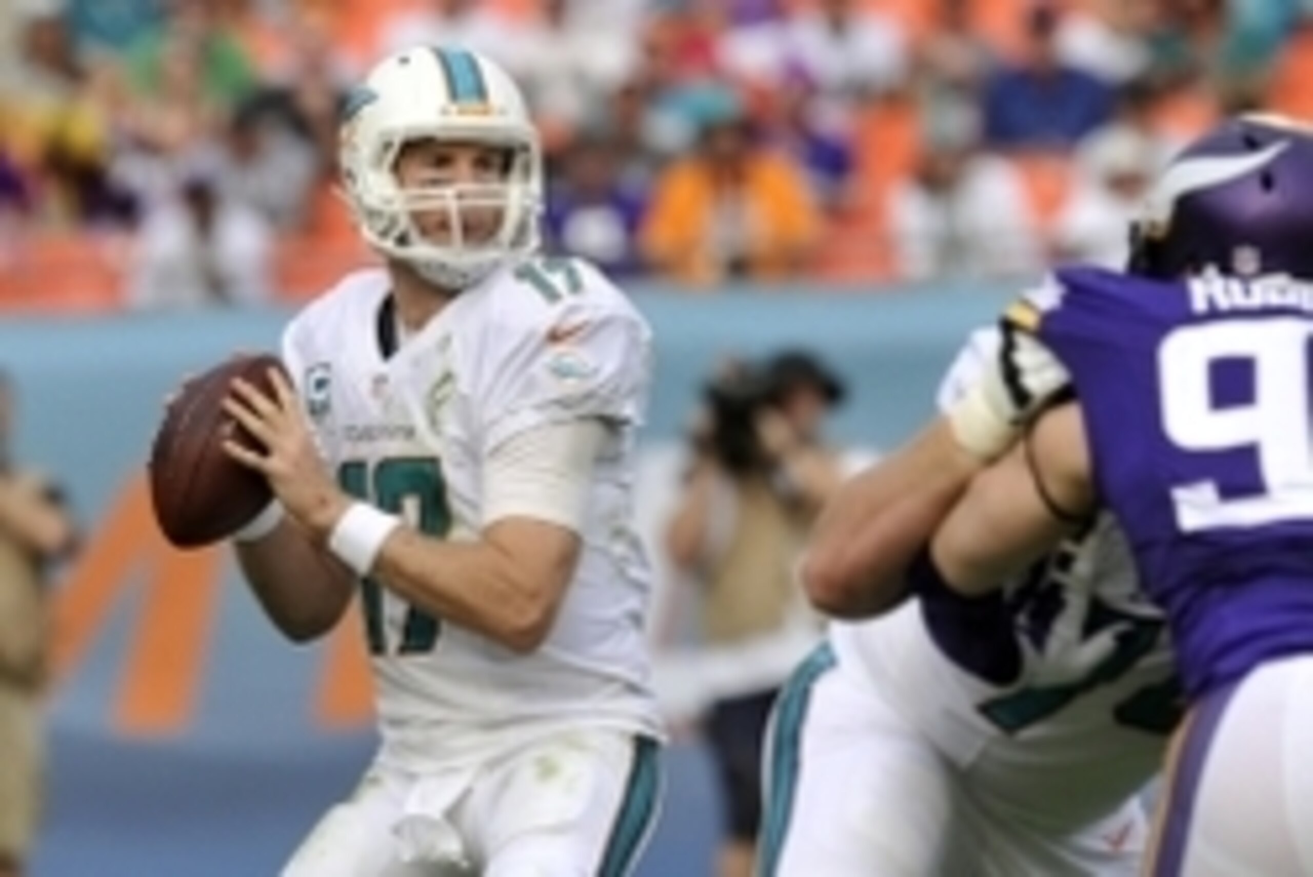 Dec 21, 2014; Miami Gardens, FL, USA; Miami Dolphins quarterback Ryan Tannehill (17) drops to pass against the Minnesota Vikings  in the second half of the game at Sun Life Stadium. Mandatory Credit: Brad Barr-USA TODAY Sports