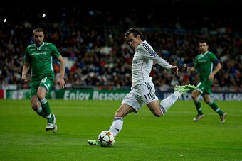 MADRID, SPAIN - DECEMBER 09: Gareth Bale of Real Madrid CF strikes the ball during the UEFA Champions League Group B match between Real Madrid CF and PFC Ludogorets Razgrad at Estadio Santiago Bernabeu on December 9, 2014 in Madrid, Spain.  (Photo by Gonz