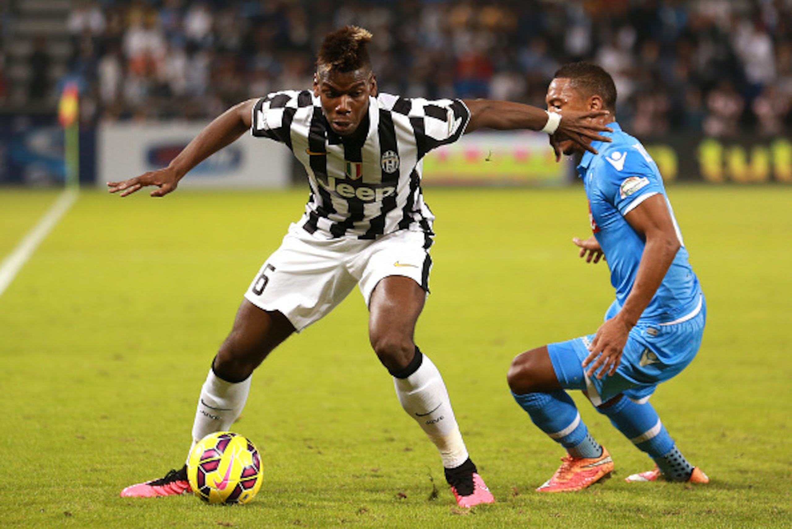 DOHA, QATAR - DECEMBER 22: Paul Pogba of Juventus in action during the 2014 Italian Super Cup match between Juventus FC v SSC Napoli at the Jassim Bin Hamad Stadium on December 22, 2014 in Doha, Qatar. (Photo by Warren Little/Getty Images) DOHA, QATAR - DECEMBER 22: Paul Pogba of Juventus in action during the 2014 Italian Super Cup match between Juventus FC v SSC Napoli at the Jassim Bin Hamad Stadium on December 22, 2014 in Doha, Qatar. (Photo by Warren Little/Getty Images)