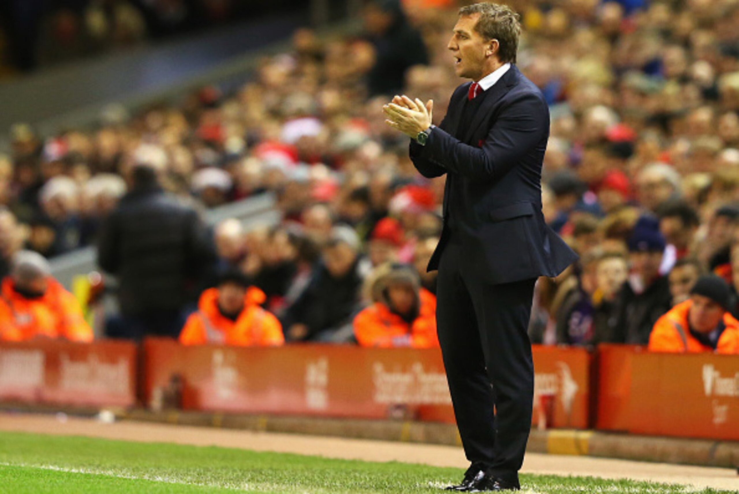 LIVERPOOL, ENGLAND - DECEMBER 21:  Brendan Rodgers, manager of Liverpool applauds during the Barclays Premier League match between Liverpool and Arsenal at Anfield on December 21, 2014 in Liverpool, England.  (Photo by Alex Livesey/Getty Images)