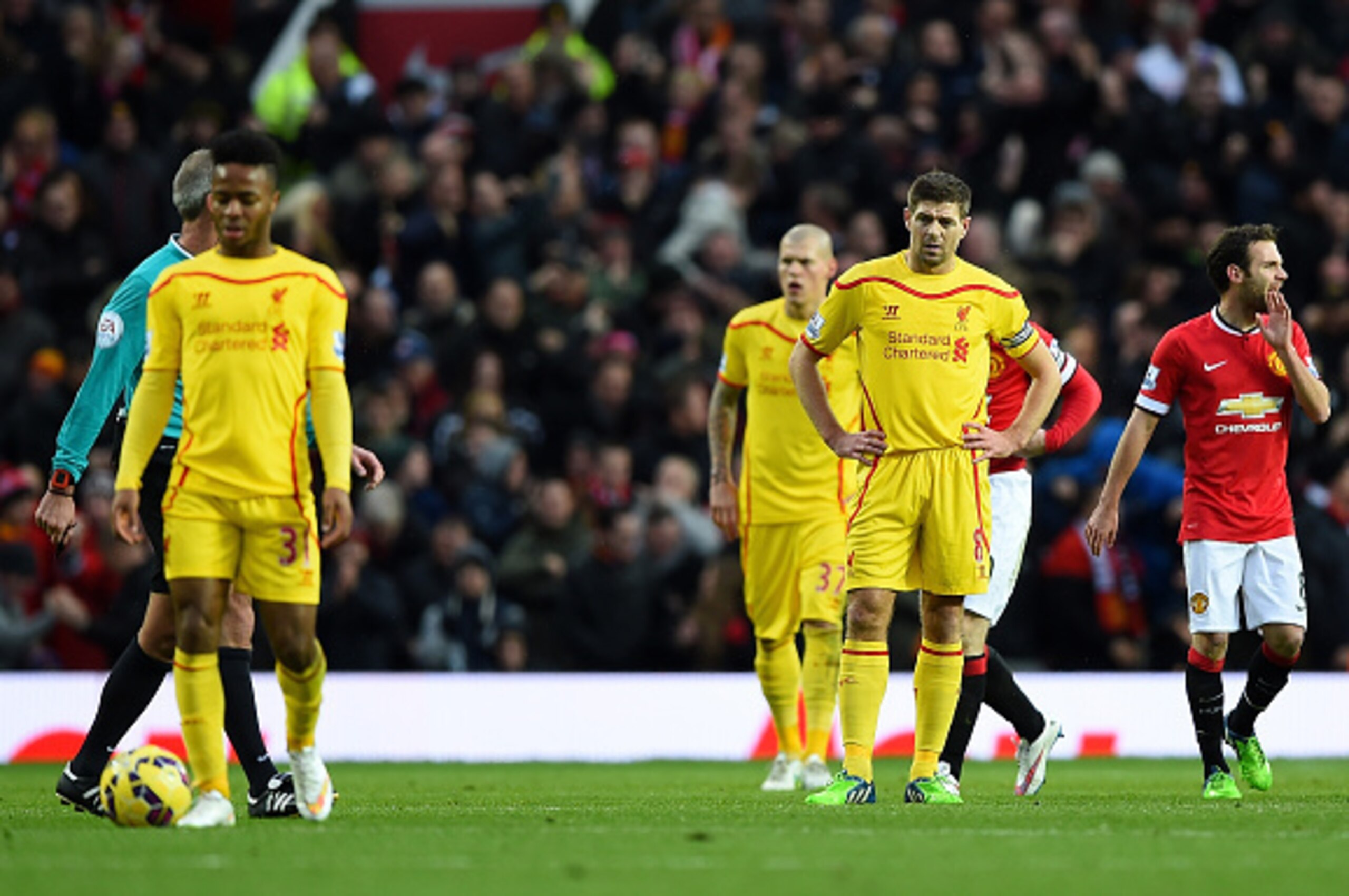 MANCHESTER, ENGLAND - DECEMBER 14:  Steven Gerrard of Liverpool looks dejected after his team conceded the first goal during the Barclays Premier League match between Manchester United and Liverpool at Old Trafford on December 14, 2014 in Manchester, Engl