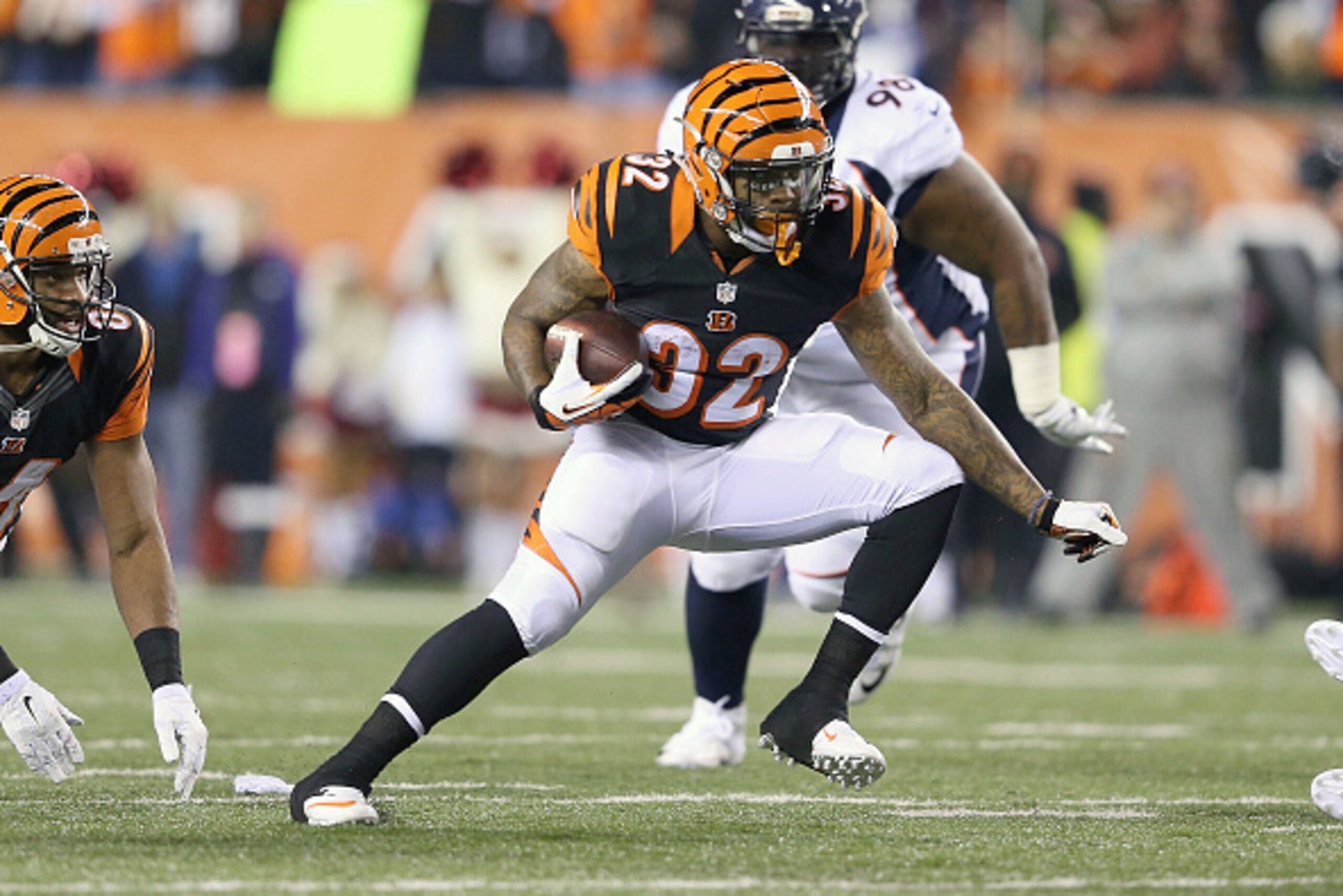 CINCINNATI, OH - DECEMBER 22:  Jeremy Hill #32 of the Cincinnati Bengals carries the ball during the second quarter of the game against the Denver Broncos at Paul Brown Stadium on December 22, 2014 in Cincinnati, Ohio. (Photo by Andy Lyons/Getty Images)