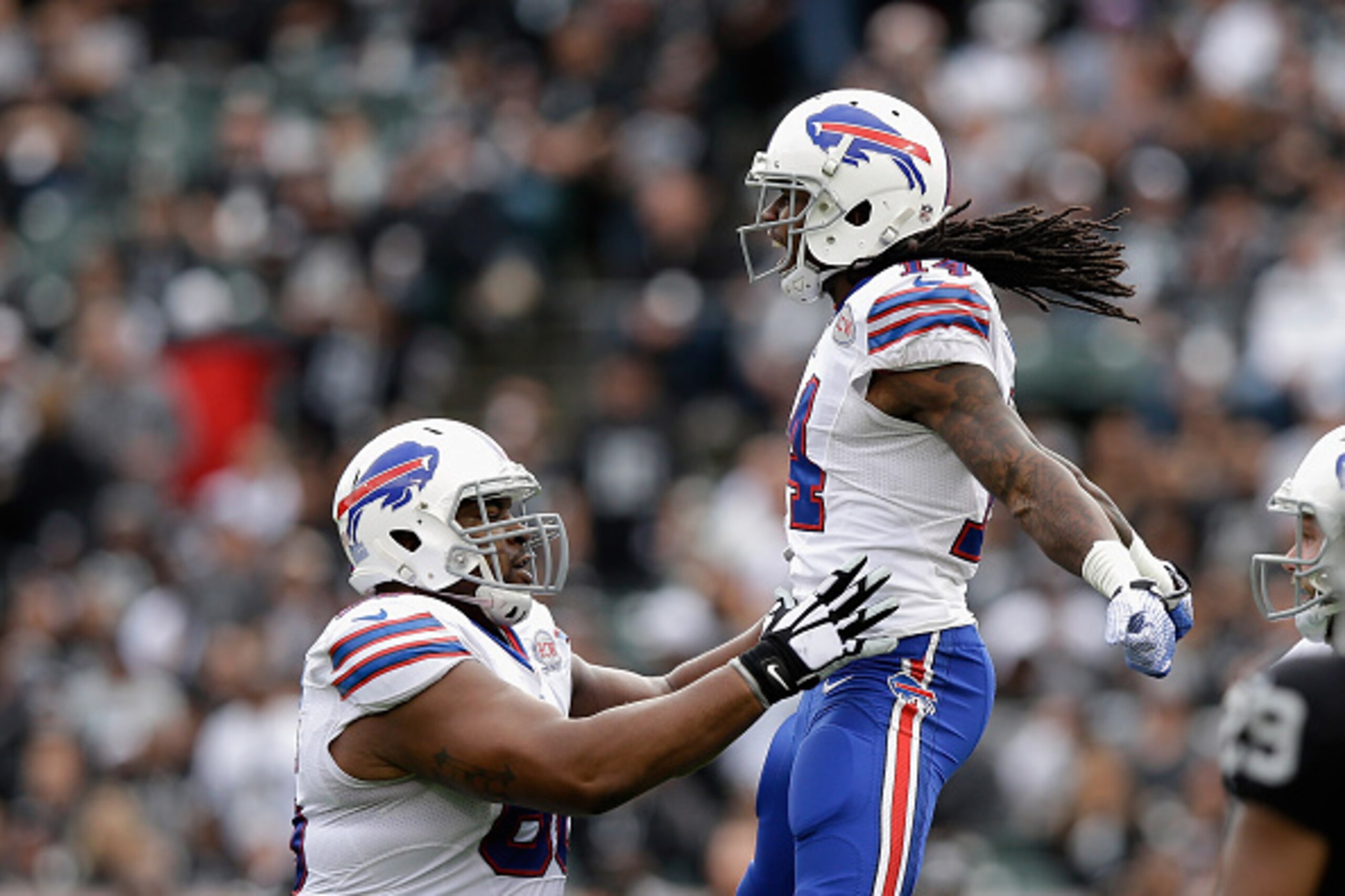 OAKLAND, CA - DECEMBER 21:  Sammy Watkins #14 of the Buffalo Bills celebrates a touchdown with Seantrel Henderson #66 of the Buffalo Bills in the first quarter of the game against the Oakland Raiders at O.co Coliseum on December 21, 2014 in Oakland, Calif