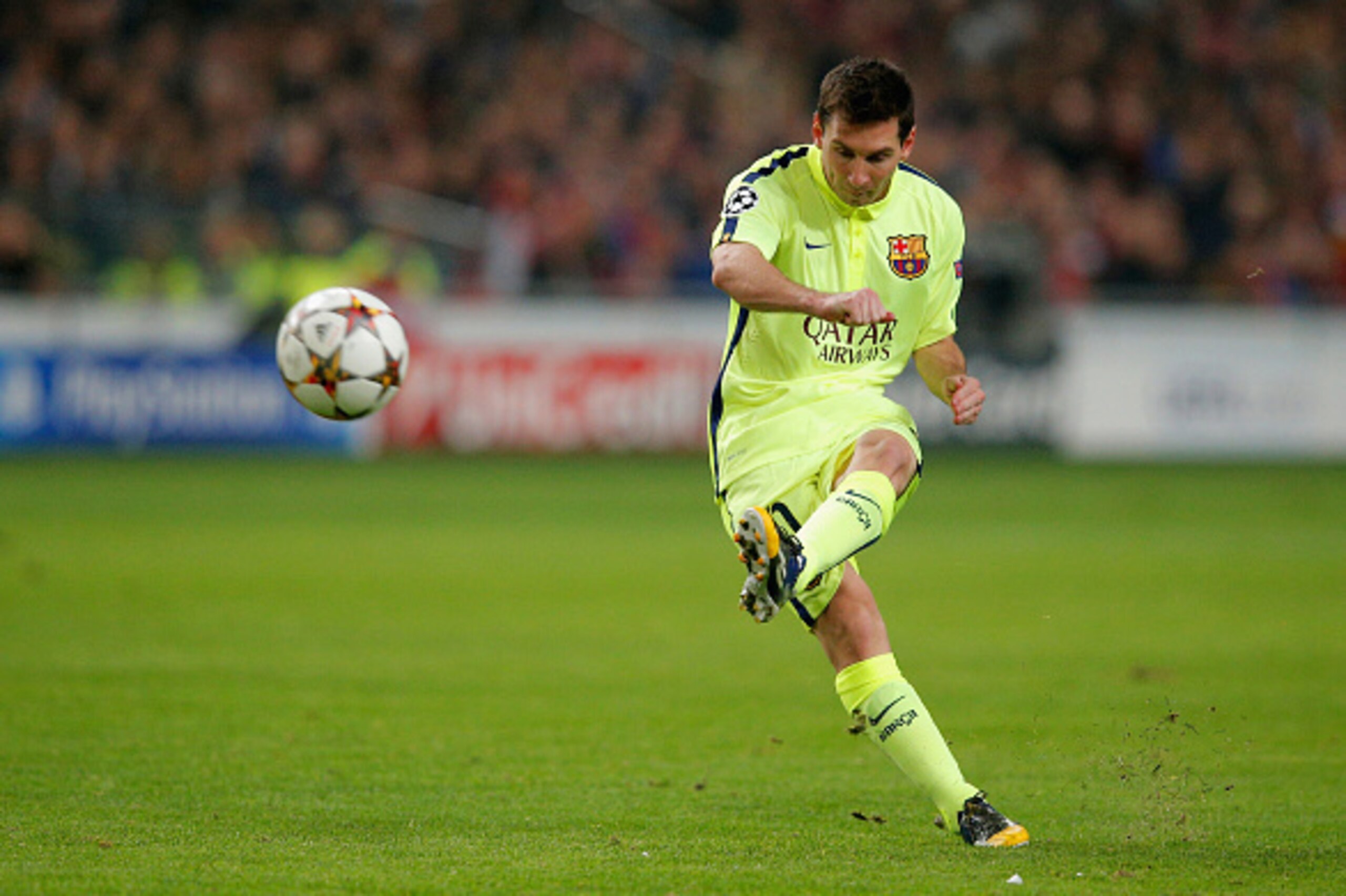 AMSTERDAM, NETHERLANDS - NOVEMBER 05:  Lionel Messi of Barcelona takes a free kick during the UEFA Champions League Group F match between AFC Ajax and FC Barcelona at The Amsterdam Arena on November 5, 2014 in Amsterdam, Netherlands.  (Photo by Dean Mouht