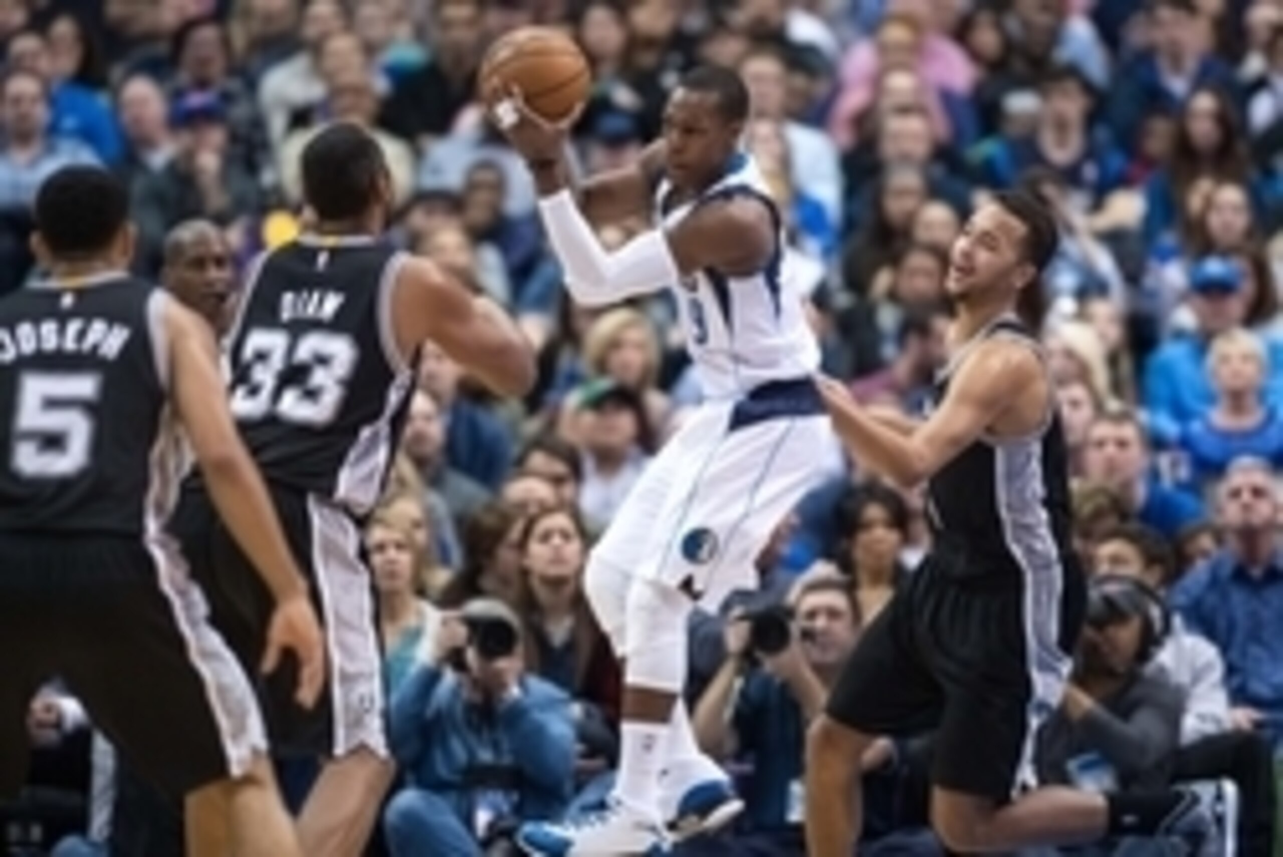 Dec 20, 2014; Dallas, TX, USA; Dallas Mavericks guard Rajon Rondo (9) grabs a rebound in front of San Antonio Spurs forward Boris Diaw (33) during the first half at the American Airlines Center. Mandatory Credit: Jerome Miron-USA TODAY Sports Dec 20, 2014; Dallas, TX, USA; Dallas Mavericks guard Rajon Rondo (9) grabs a rebound in front of San Antonio Spurs forward Boris Diaw (33) during the first half at the American Airlines Center. Mandatory Credit: Jerome Miron-USA TODAY Sports