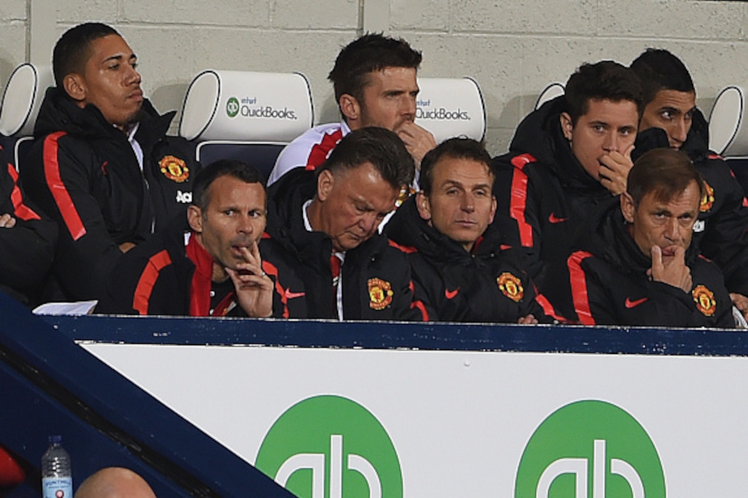 WEST BROMWICH, ENGLAND - OCTOBER 20:  Louis van Gaal manager of Manchester United (3L) and assistant Ryan Giggs (2L) look on from the bench during the Barclays Premier League match between West Bromwich Albion and Manchester United at The Hawthorns on Oct
