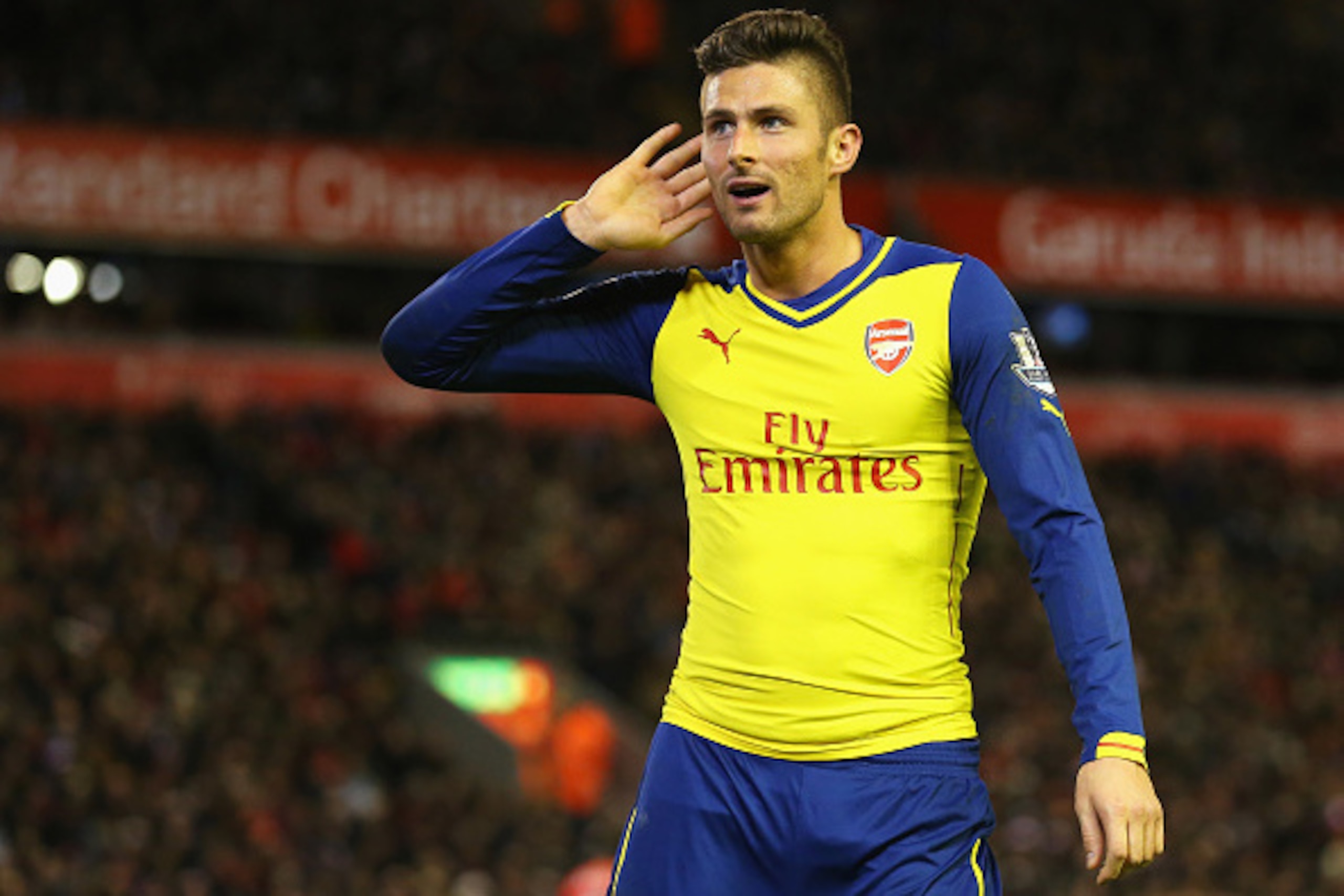 LIVERPOOL, ENGLAND - DECEMBER 21:  Olivier Giroud of Arsenal celebrates scoring his goal during the Barclays Premier League match between Liverpool and Arsenal at Anfield on December 21, 2014 in Liverpool, England.  (Photo by Alex Livesey/Getty Images)