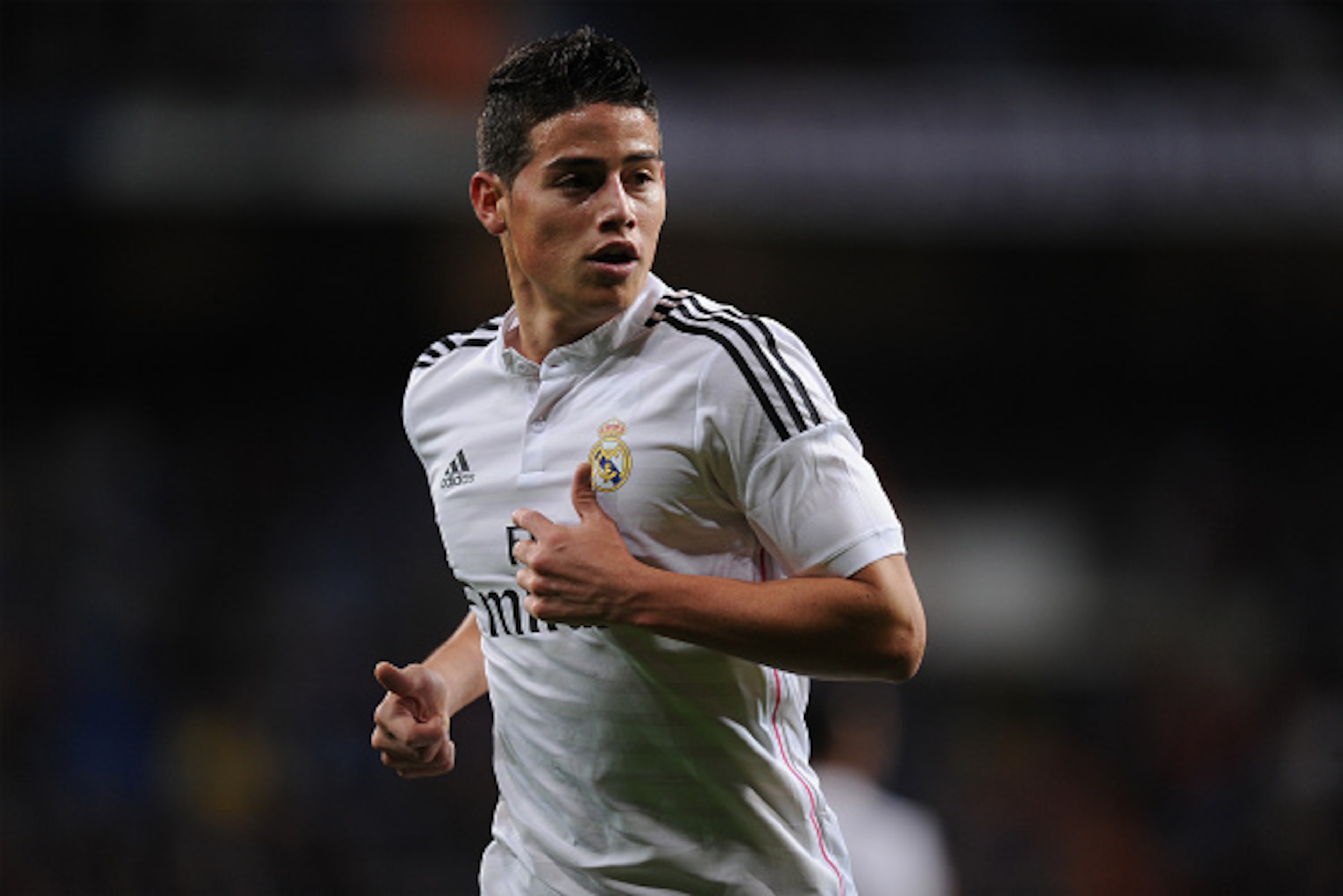 MADRID, SPAIN - DECEMBER 02:  James Rodriguez looks on during the Copa Del Rey Round of 32, Second Leg match between Real Madrid CF and Cornella at Santiago Bernabeu stadium on December 2, 2014 in Madrid, Spain.  (Photo by Denis Doyle/Getty Images)
