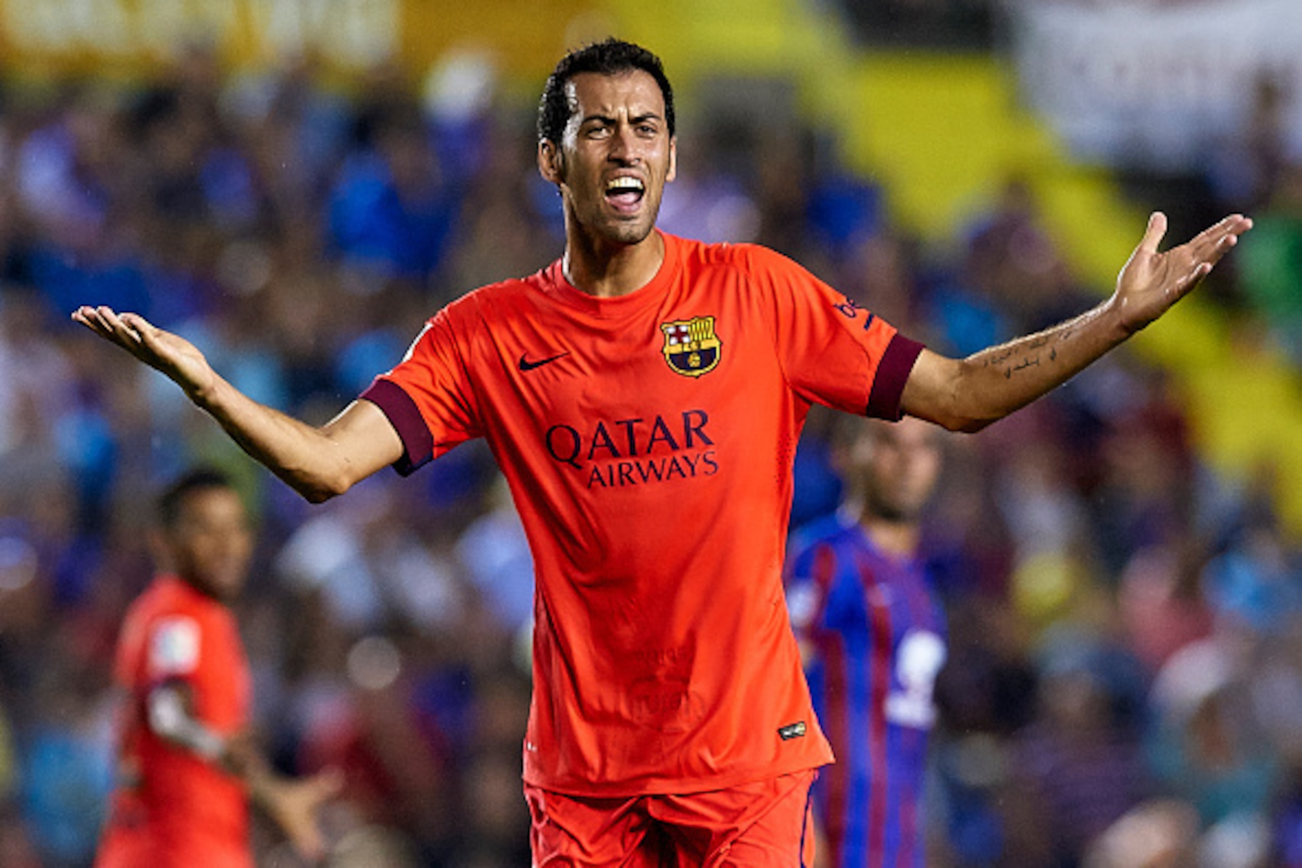 VALENCIA, SPAIN - SEPTEMBER 21:  Sergio Busquets of Barcelona reacts during the La Liga match between Levante UD and FC Barcelona at Ciutat de Valencia on September 21, 2014 in Valencia, Spain.  (Photo by Manuel Queimadelos Alonso/Getty Images)
