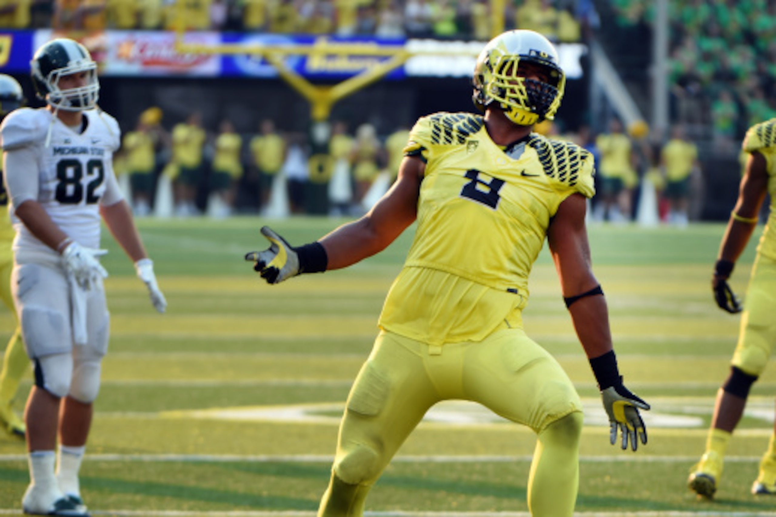 EUGENE, OR -SEPTEMBER 06: Defensive lineman Arik Armstead #9 of the Oregon Ducks celebrates a sack during the third quarter of the game against the Michigan State Spartans at Autzen Stadium on September 6, 2014 in Eugene, Oregon. Oregon won the game 46-27