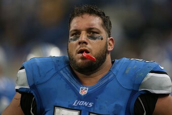 DETROIT, MI - NOVEMBER 18: Dominic Raiola #51 of the Detroit Lions reacts to the loss against the Green Bay Packers  at Ford Field on November 18, 2012 in Detroit, Michigan. The Packers defeated the Lions 24-20. (Photo by Leon Halip/Getty Images)