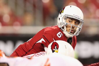 GLENDALE, AZ - AUGUST 24:  Quarterback Logan Thomas #6 of the Arizona Cardinals prepares to snap the football during the preseason NFL game against the Cincinnati Bengals at the University of Phoenix Stadium on August 24, 2014 in Glendale, Arizona.  The B
