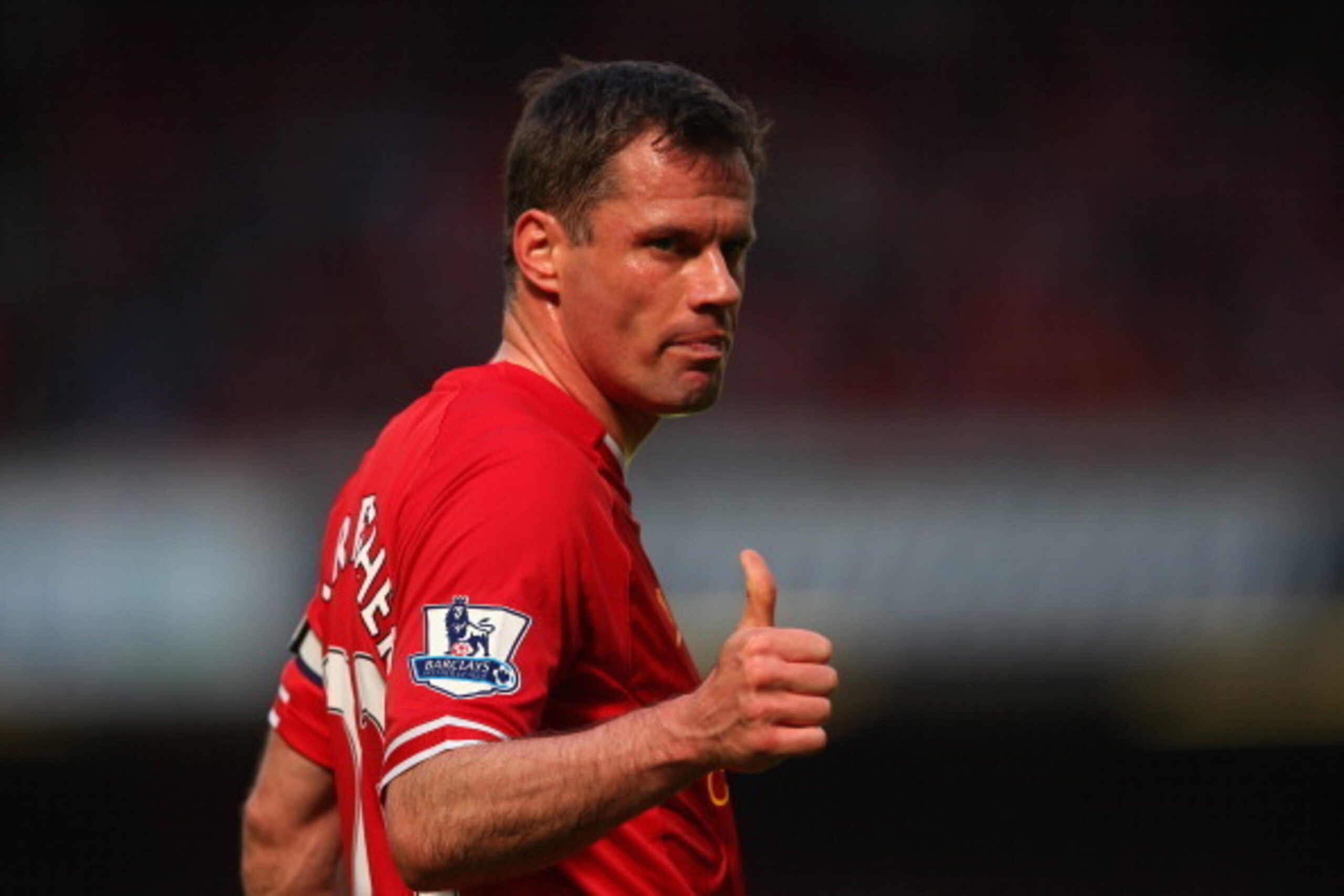 LIVERPOOL, ENGLAND - MAY 19:  Jamie Carragher of Liverpool gives a thumbs up during the Barclays Premier League match between Liverpool and Queens Park Rangers at Anfield on May 19, 2013 in Liverpool, England.  (Photo by Julian Finney/Getty Images)