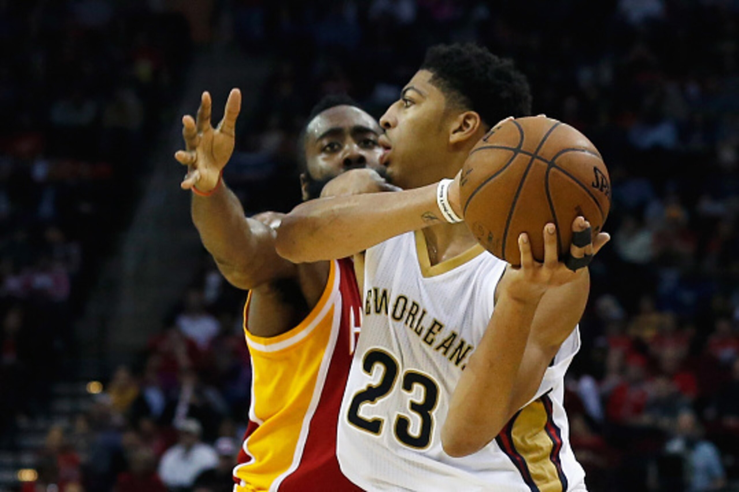 HOUSTON, TX - DECEMBER 18:  HOUSTON, TX - DECEMBER18:  James Harden #13 of the Houston Rockets defends against Anthony Davis #23 of the New Orleans Pelicans during their game at the Toyota Center on December18, 2014 in Houston, Texas.  NOTE TO USER: User 