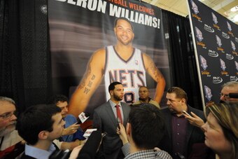 EAST RUTHERFORD, NJ - FEBRUARY 24: Deron Williams talks with the media during a press conference announcing his trade to the New Jersey Nets on February 24, 2011 at the PNY Center in East Rutherford, New Jersey.  NOTE TO USER: User expressly acknowledges 